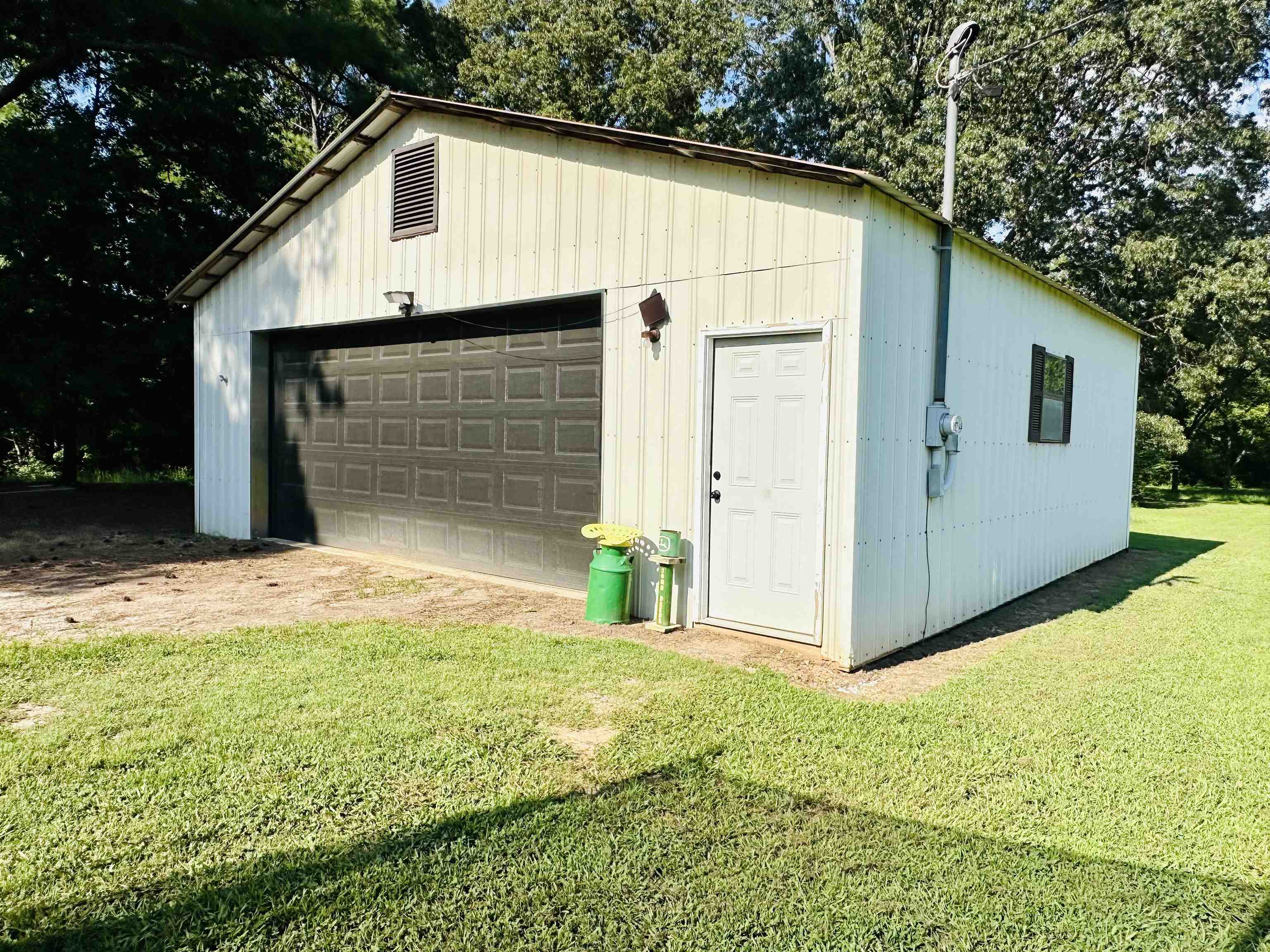 7120 Powell Chapel Road Hornsby, TN 38044 - Photo 23 of 29 front view of a house with a yard