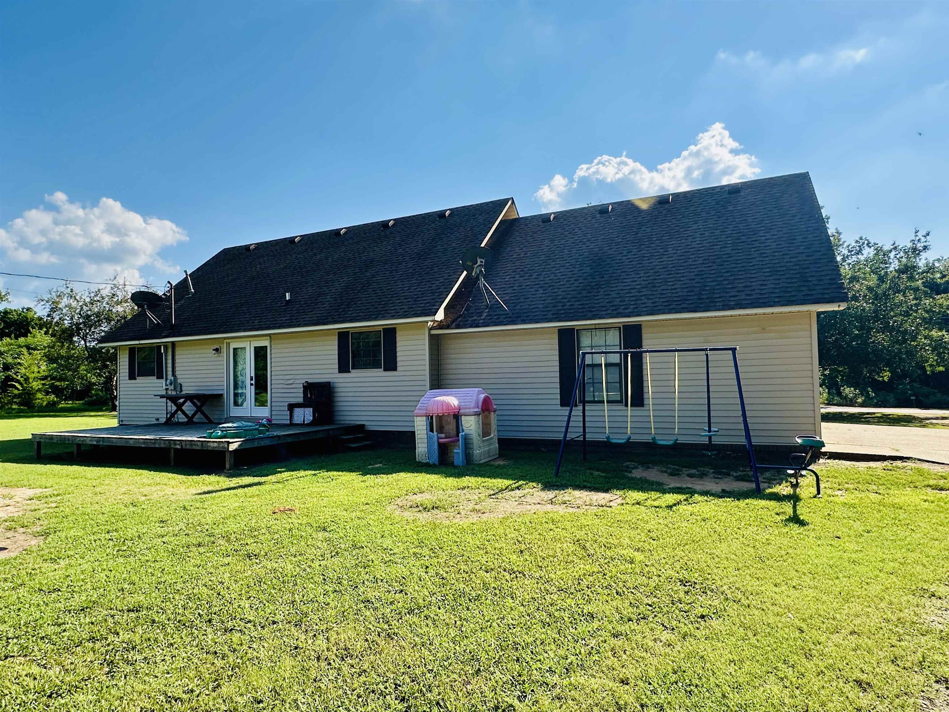7120 Powell Chapel Road Hornsby, TN 38044 - Photo 25 of 29 a view of a house with swimming pool and a yard