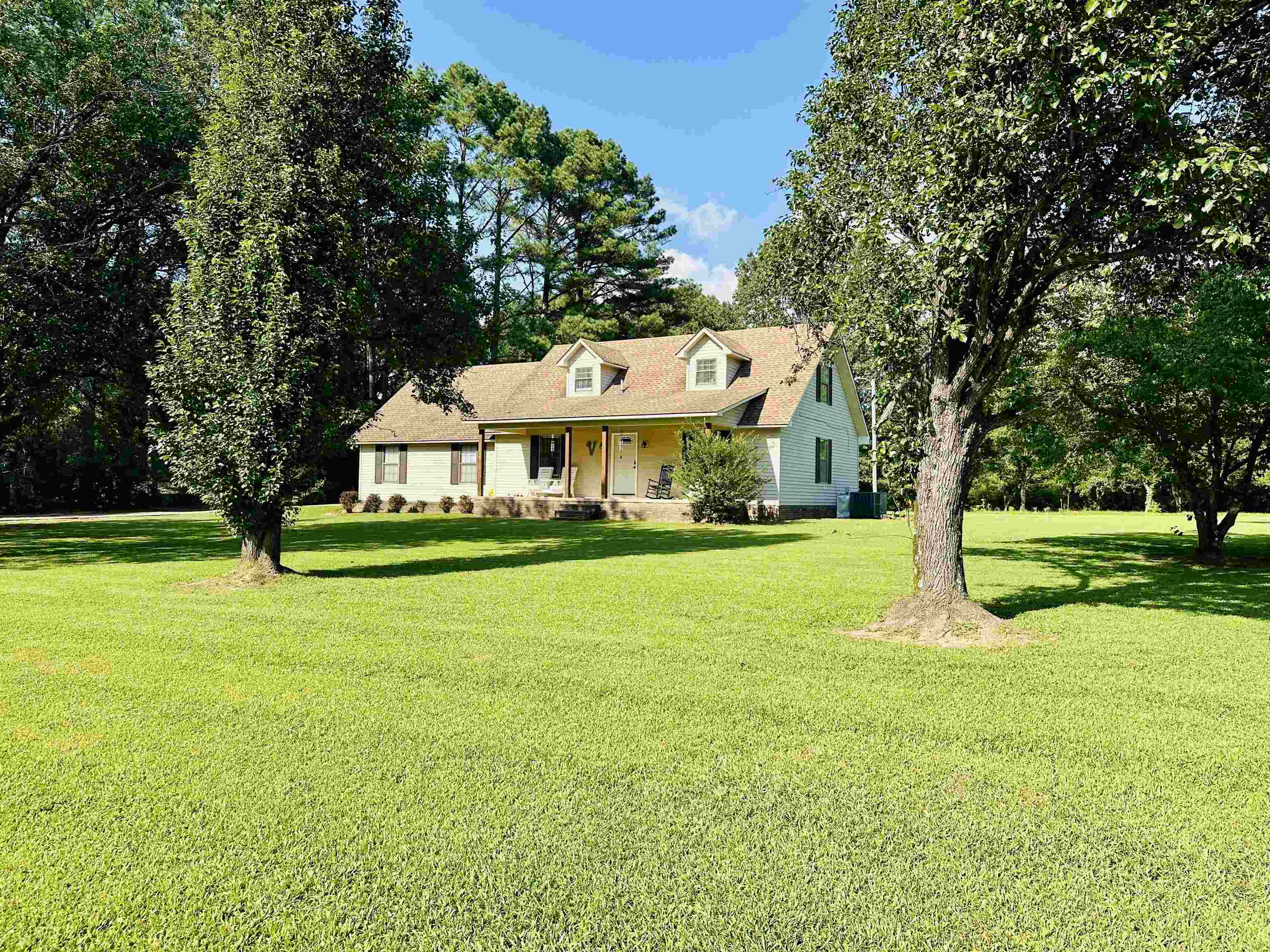 7120 Powell Chapel Road Hornsby, TN 38044 - Photo 28 of 29 a front view of a house with garden