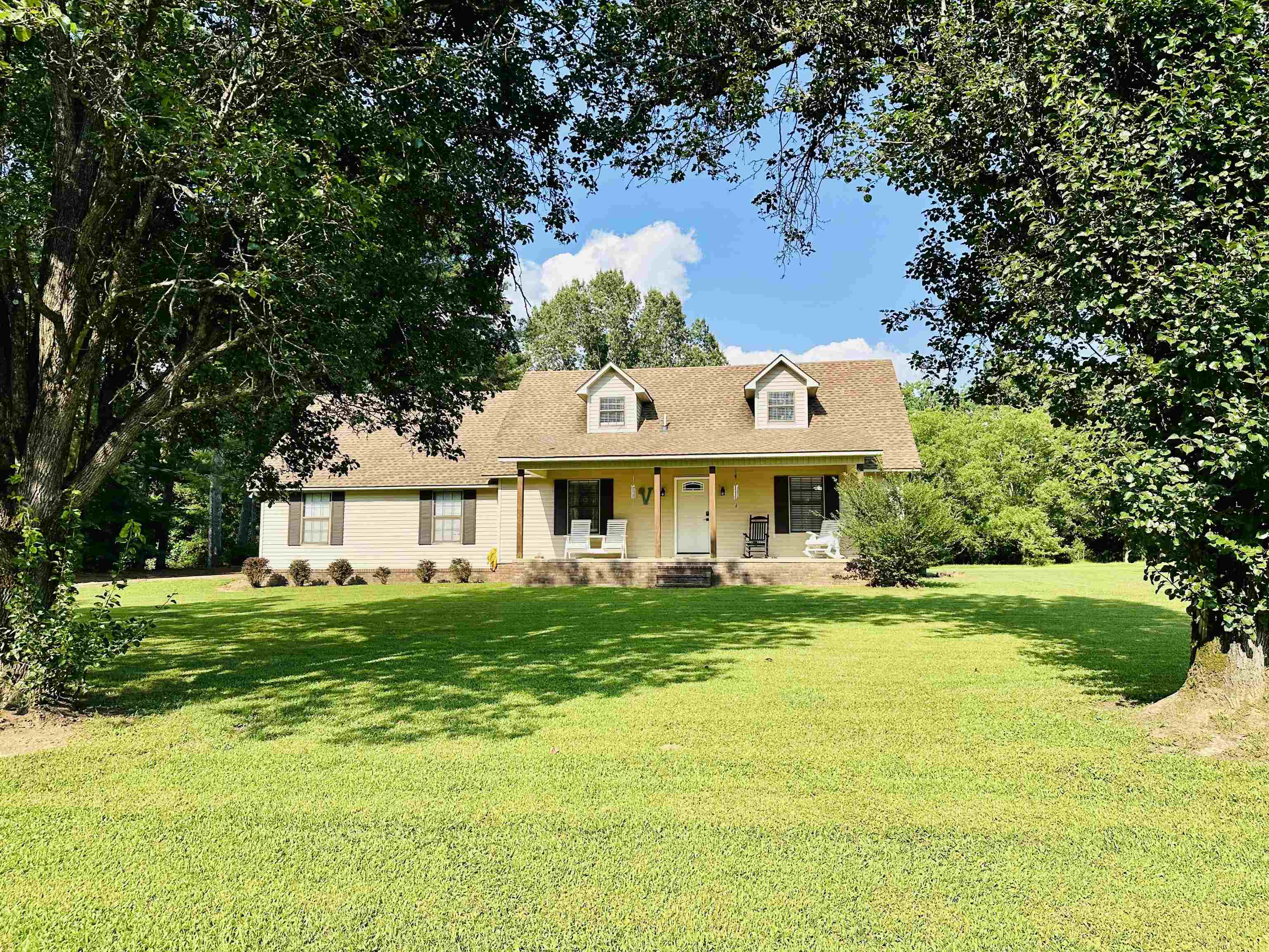 7120 Powell Chapel Road Hornsby, TN 38044 - Photo 29 of 29 a front view of a house with a garden