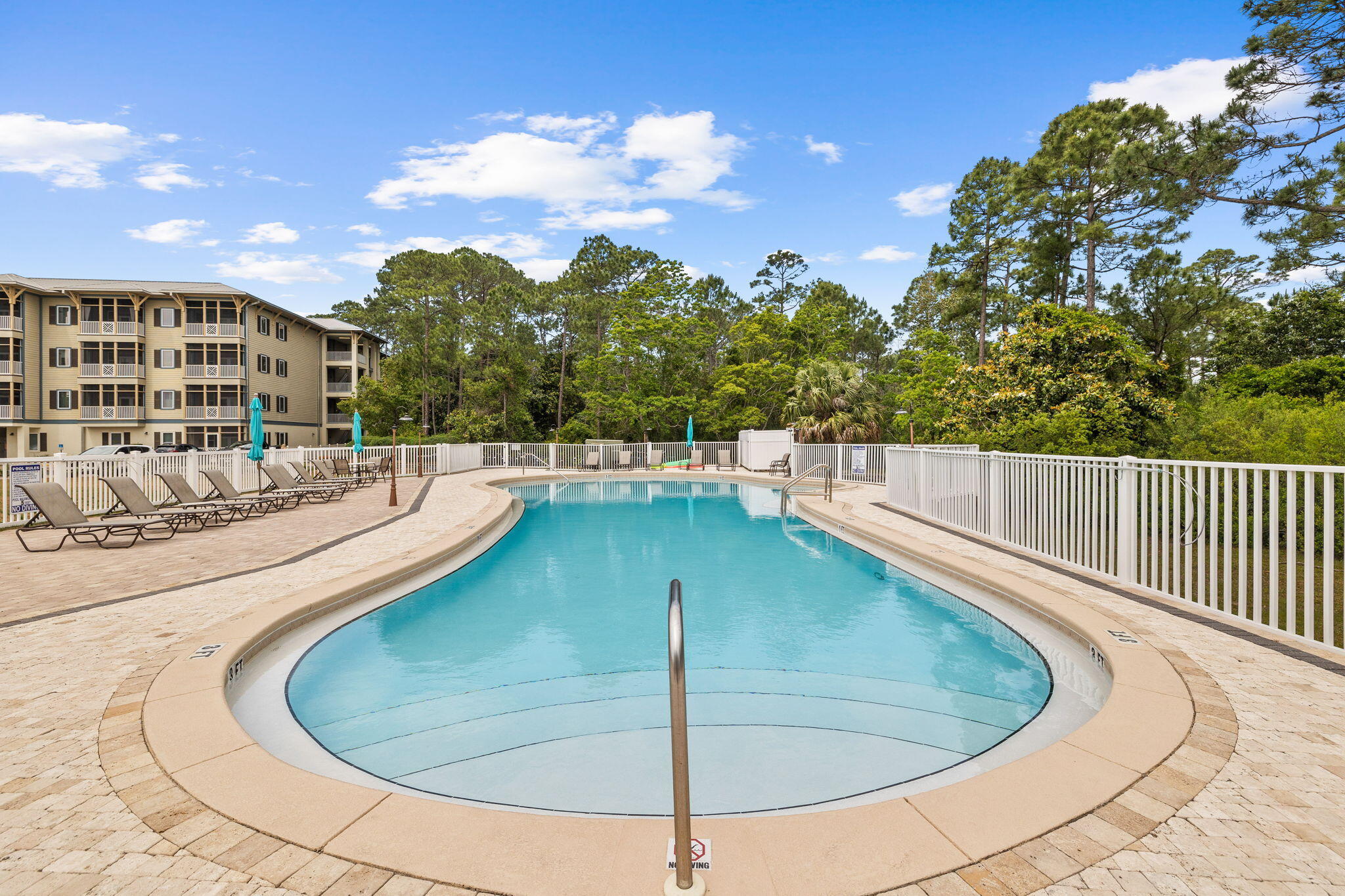231 Somerset Bridge Road, Unit 2109 Santa Rosa Beach, FL 32459 - Photo 15 of 31 a view of a swimming pool with a patio