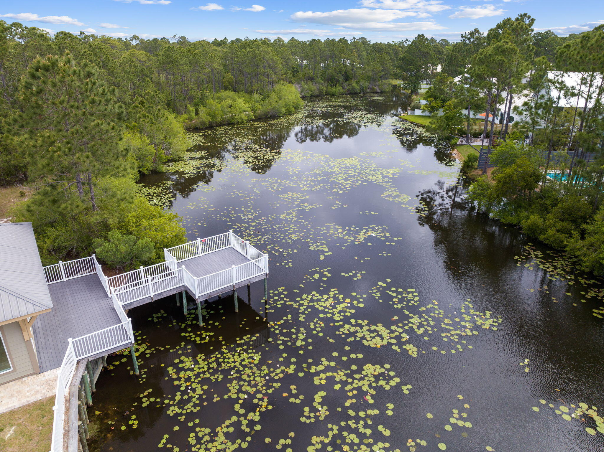 231 Somerset Bridge Road, Unit 2109 Santa Rosa Beach, FL 32459 - Photo 19 of 31 a view of a lake with a mountain in the background