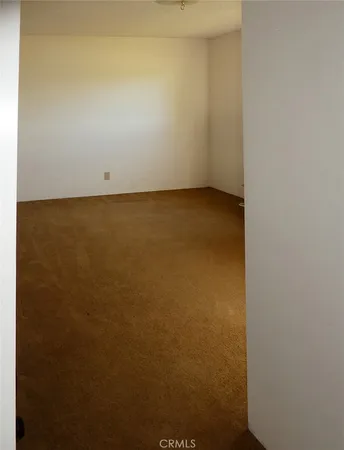 an empty room with a bench