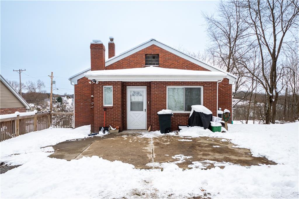 177 Bryson Road Gibsonia, PA 15044 - Photo 3 of 17 a view of a house with snow on the background