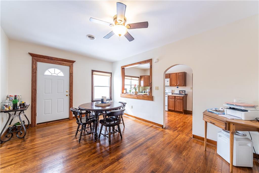 177 Bryson Road Gibsonia, PA 15044 - Photo 7 of 17 a view of a dining room with furniture and wooden floor