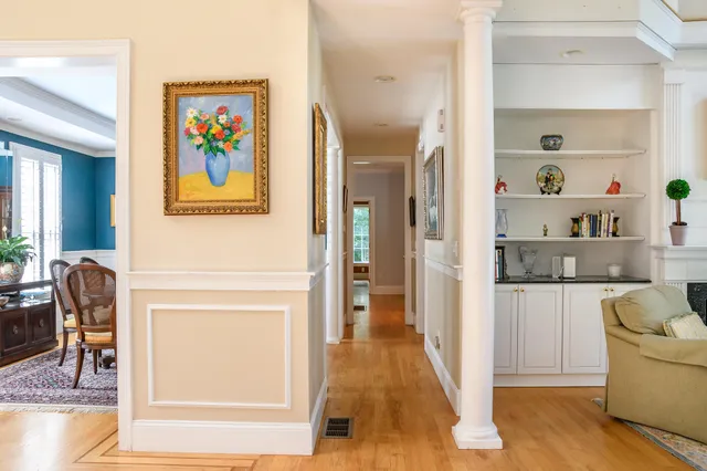 a view of living room with furniture and painting on the wall