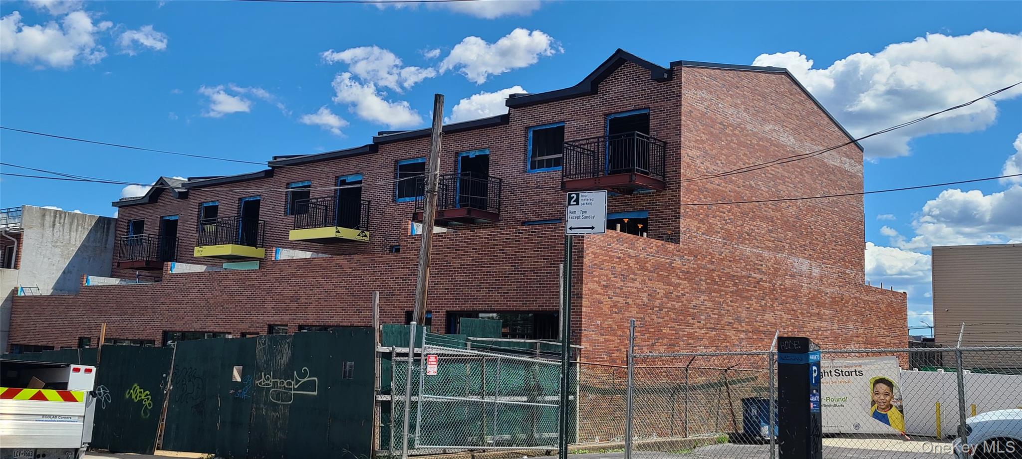 150-18 12th Road Queens, NY 11357 - Photo 1 of 8 a front view of a house with a yard
