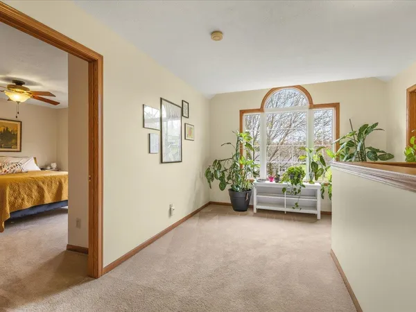 a bathroom with a shower and a window