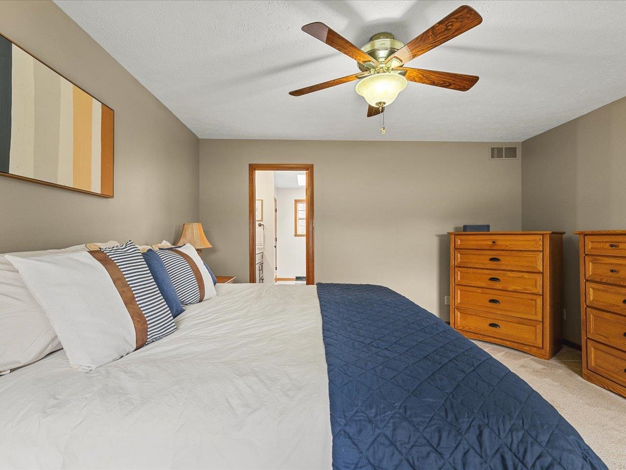 8027 Barclay Road Rockford, IL 61102 - Photo 28 of 67 a bedroom with a bed and a closet