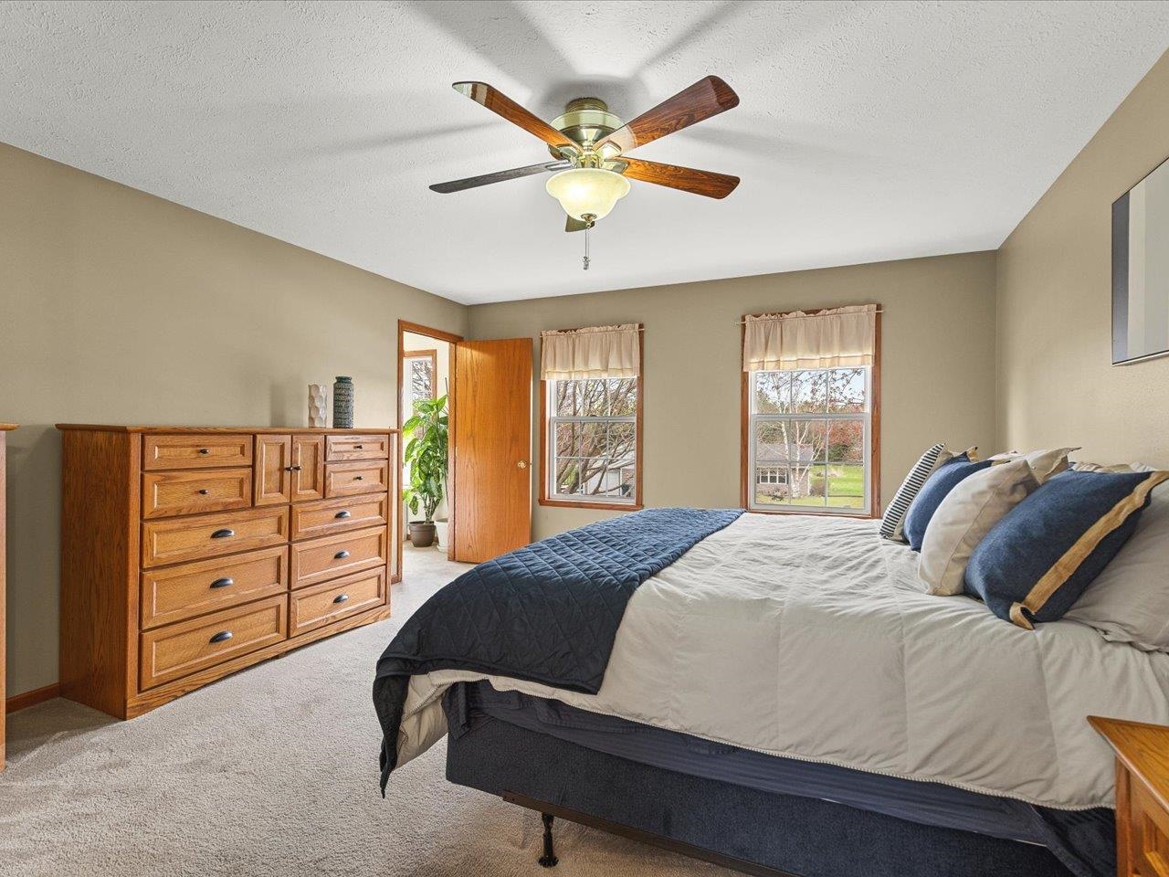 8027 Barclay Road Rockford, IL 61102 - Photo 29 of 67 a bedroom with a bed and window