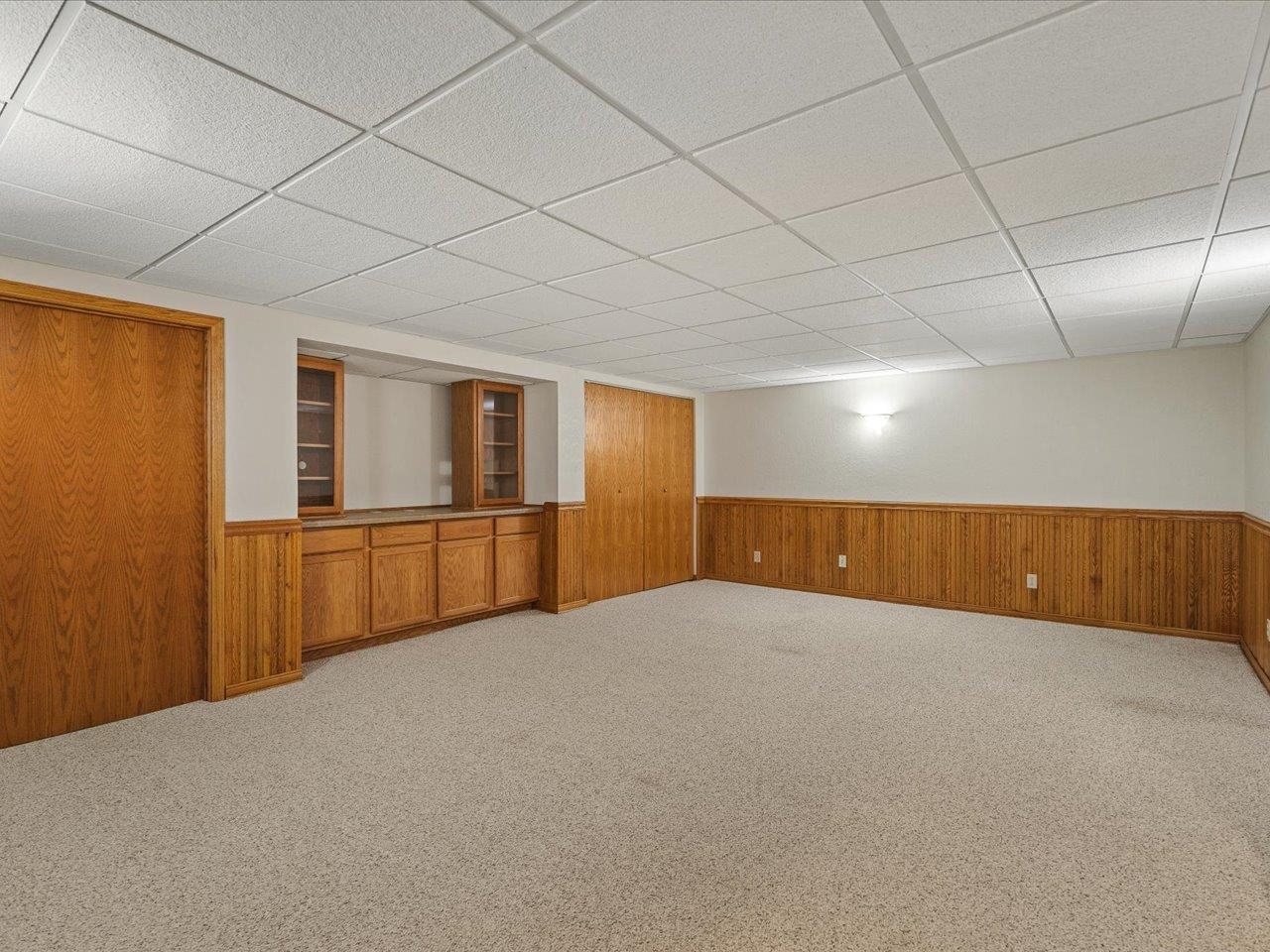 8027 Barclay Road Rockford, IL 61102 - Photo 43 of 67 a view of an empty room with wooden floor