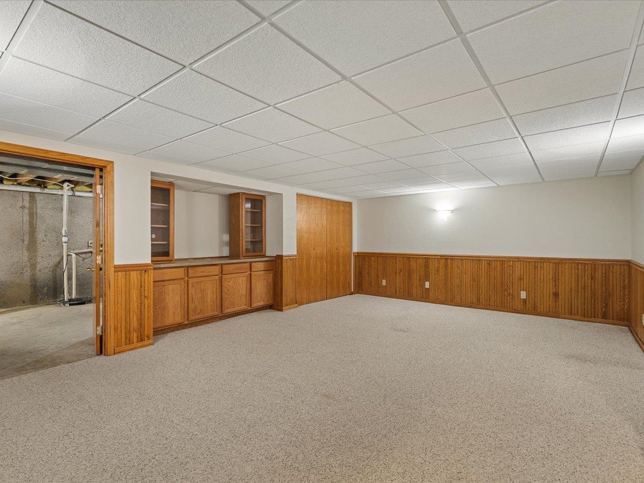 8027 Barclay Road Rockford, IL 61102 - Photo 44 of 67 a view of an empty room with wooden floor