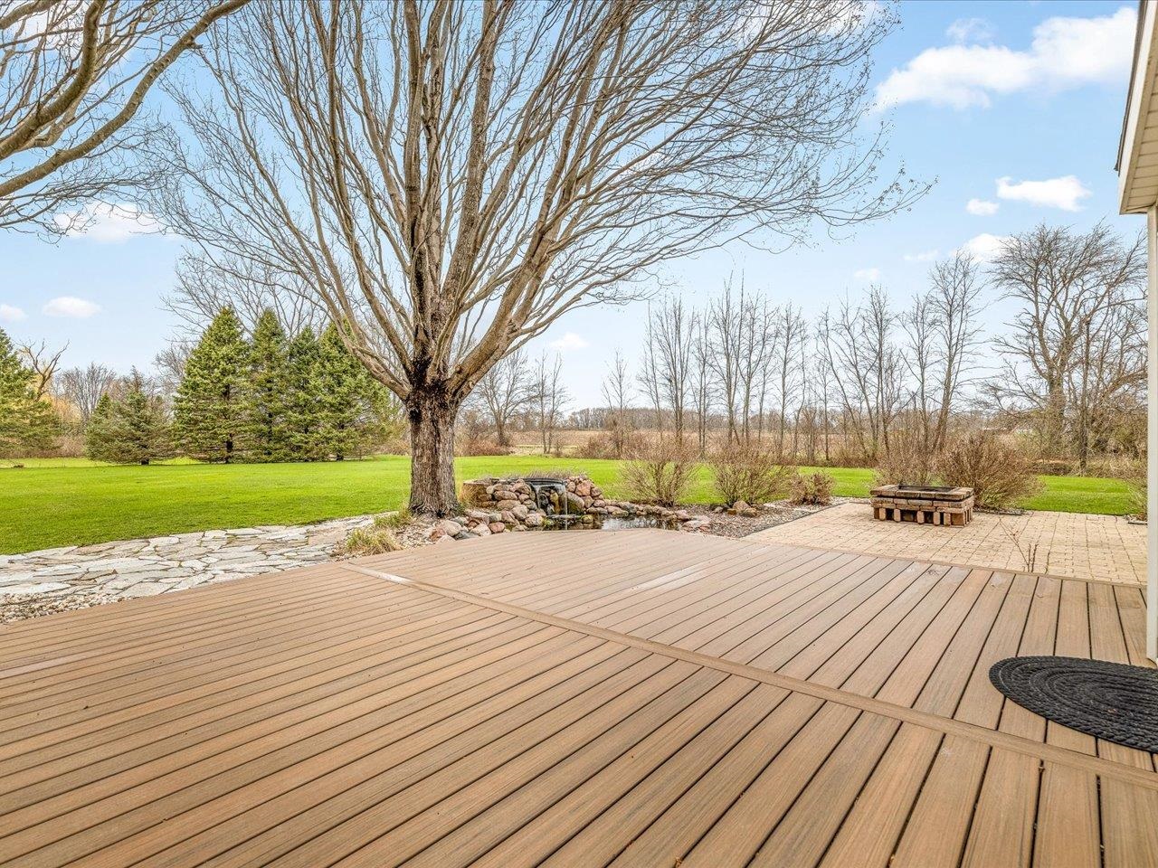8027 Barclay Road Rockford, IL 61102 - Photo 49 of 67 a view of a house with a yard