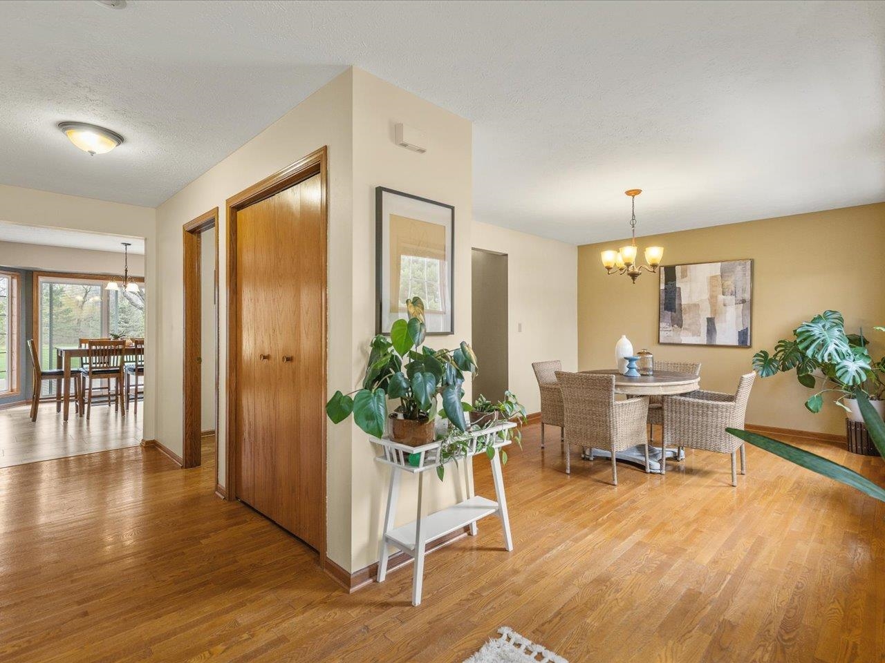 8027 Barclay Road Rockford, IL 61102 - Photo 6 of 67 a view of a dining room with furniture and wooden floor