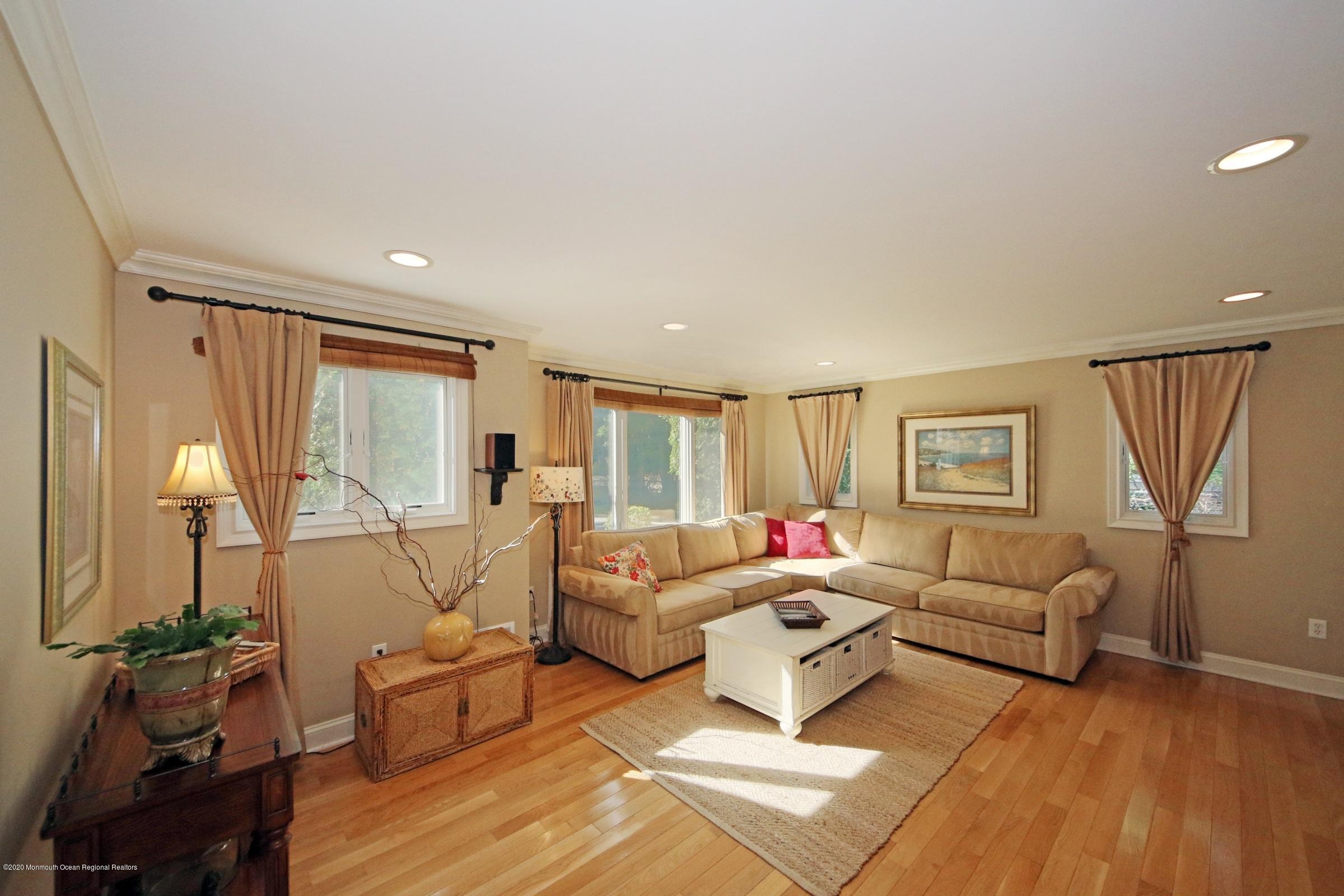 18 Daniel Drive Little Silver, NJ 07739 - Photo 12 of 55 a living room with furniture and a large window