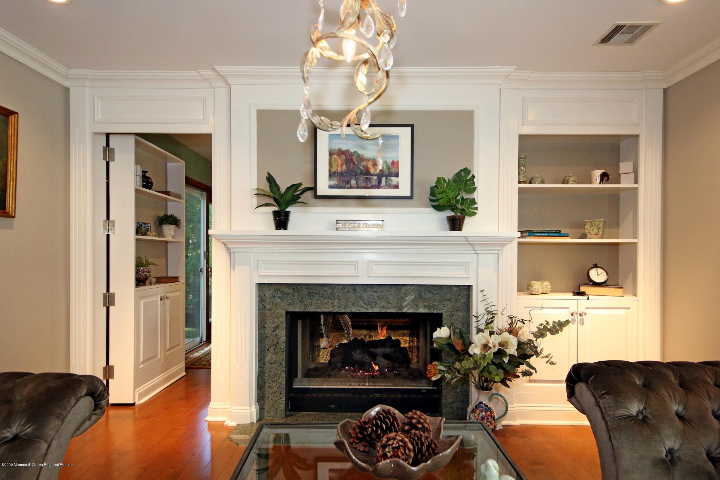 18 Daniel Drive Little Silver, NJ 07739 - Photo 17 of 55 a living room with furniture and a fireplace
