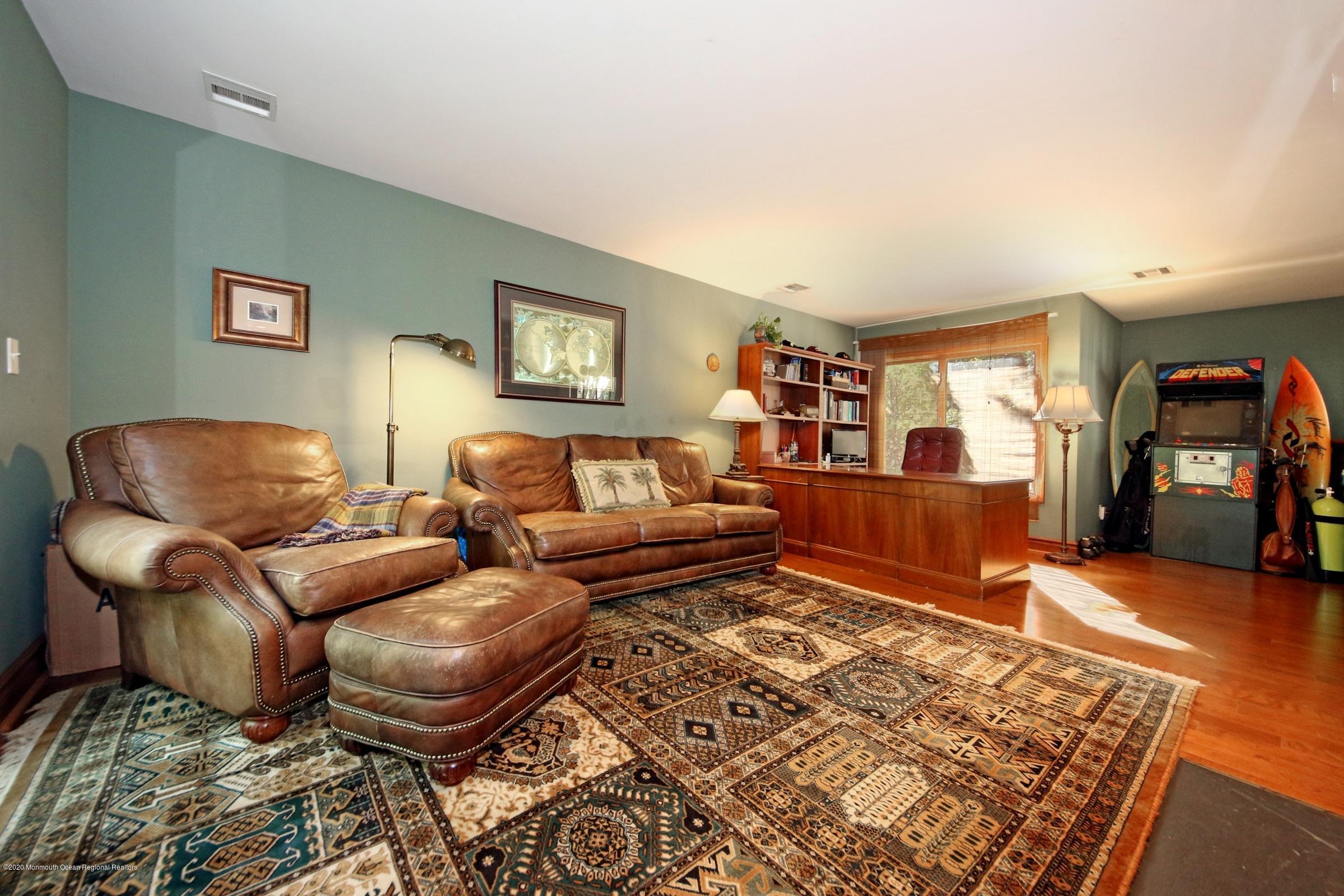 18 Daniel Drive Little Silver, NJ 07739 - Photo 18 of 55 a living room with furniture and a rug