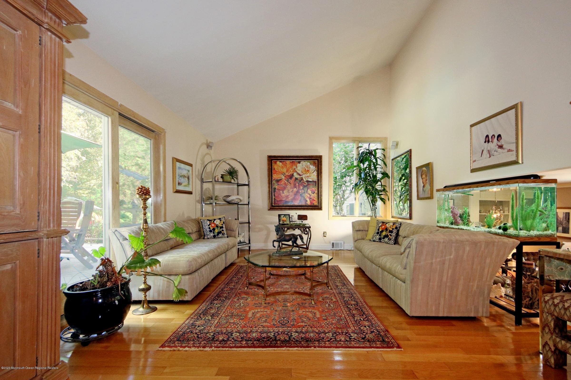 18 Daniel Drive Little Silver, NJ 07739 - Photo 20 of 55 a living room with furniture large window and flat screen tv