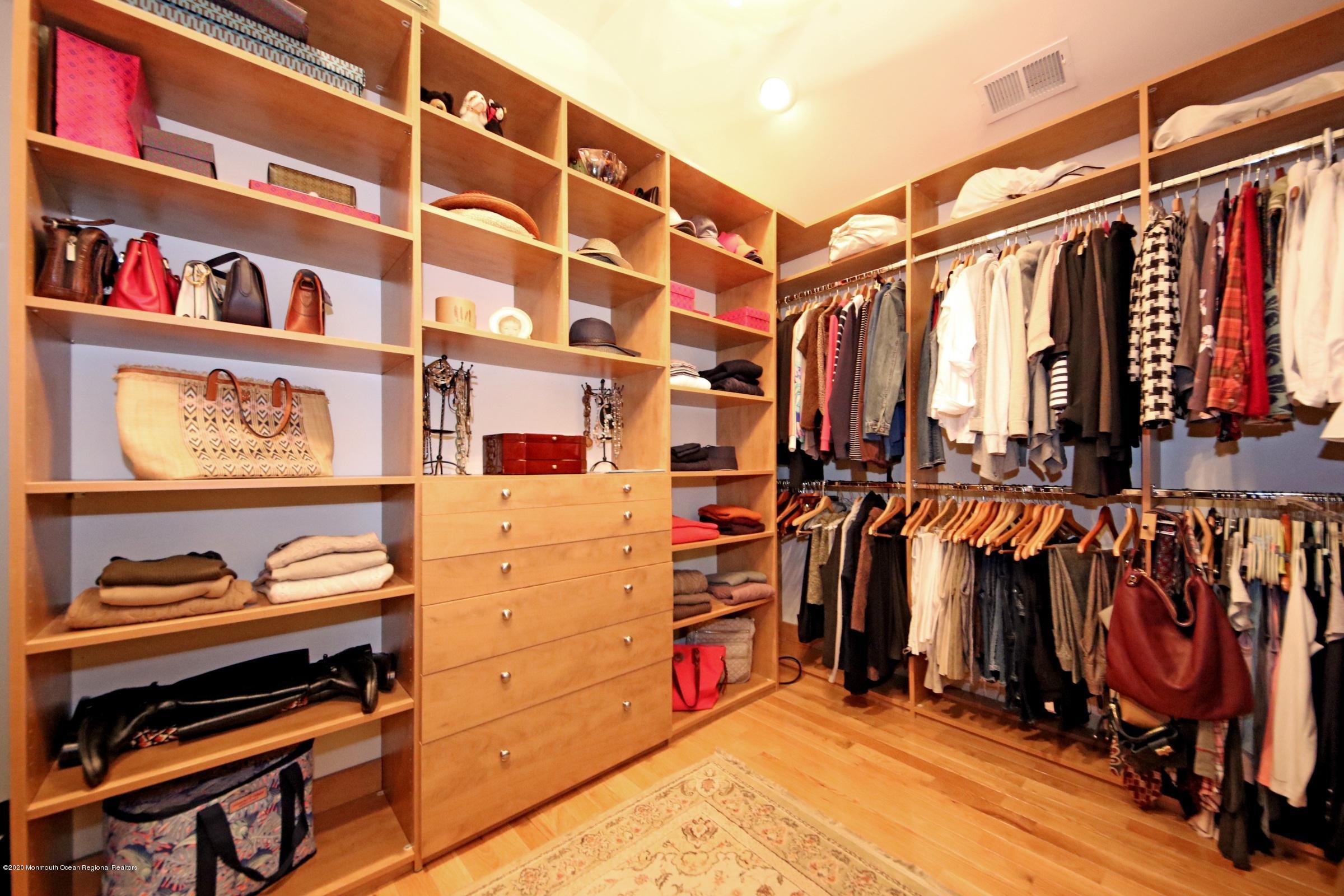 18 Daniel Drive Little Silver, NJ 07739 - Photo 34 of 55 a view of walk in closet with clothes and shoes