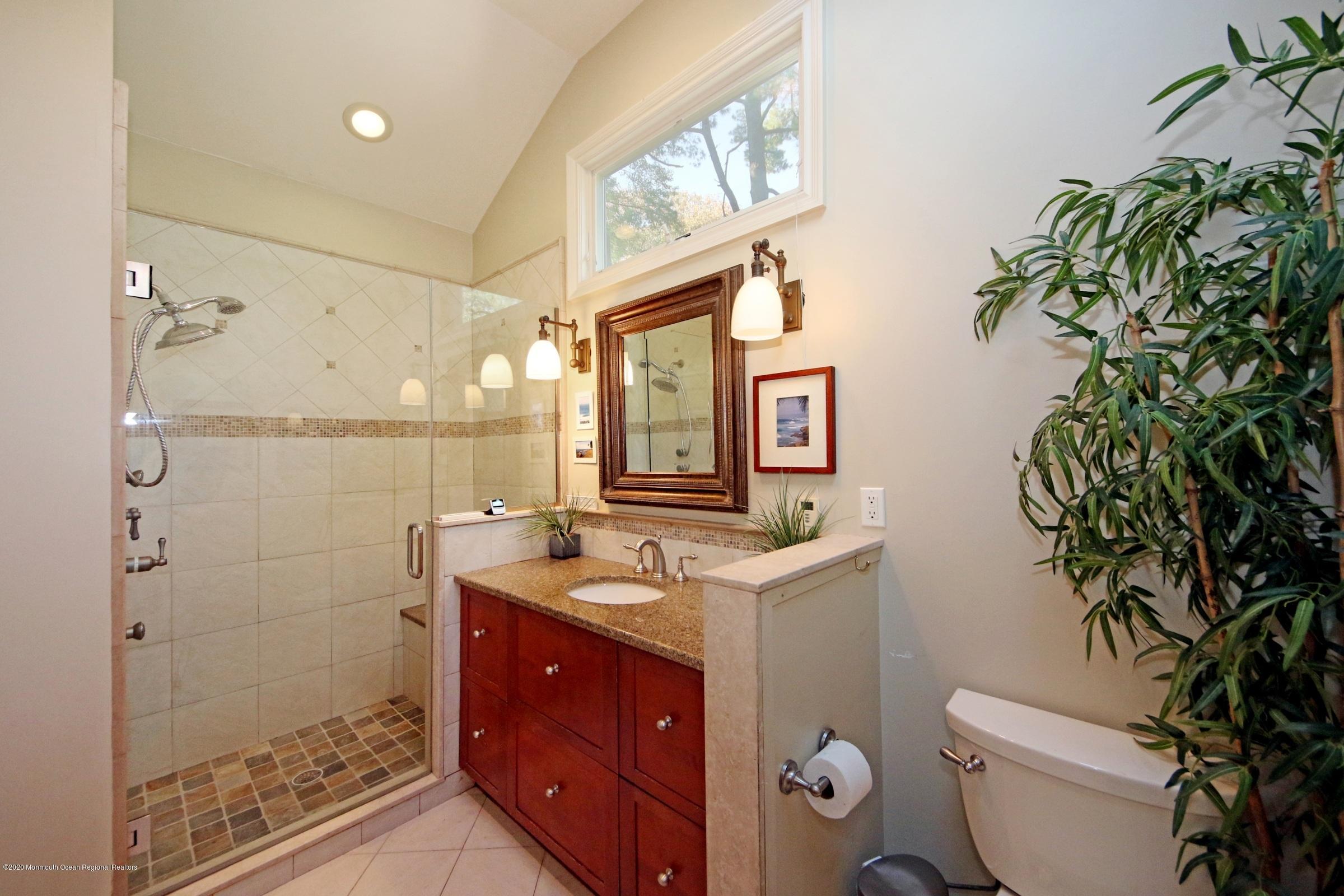 18 Daniel Drive Little Silver, NJ 07739 - Photo 35 of 55 a bathroom with a sink a toilet and shower