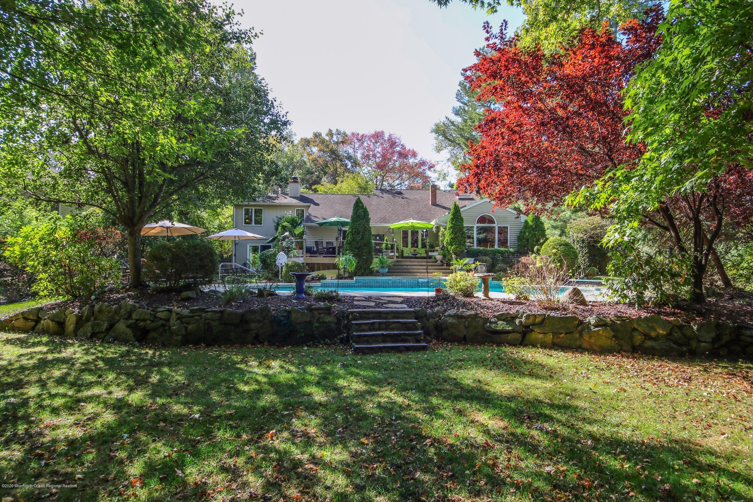 18 Daniel Drive Little Silver, NJ 07739 - Photo 49 of 55 a view of a backyard with a garden