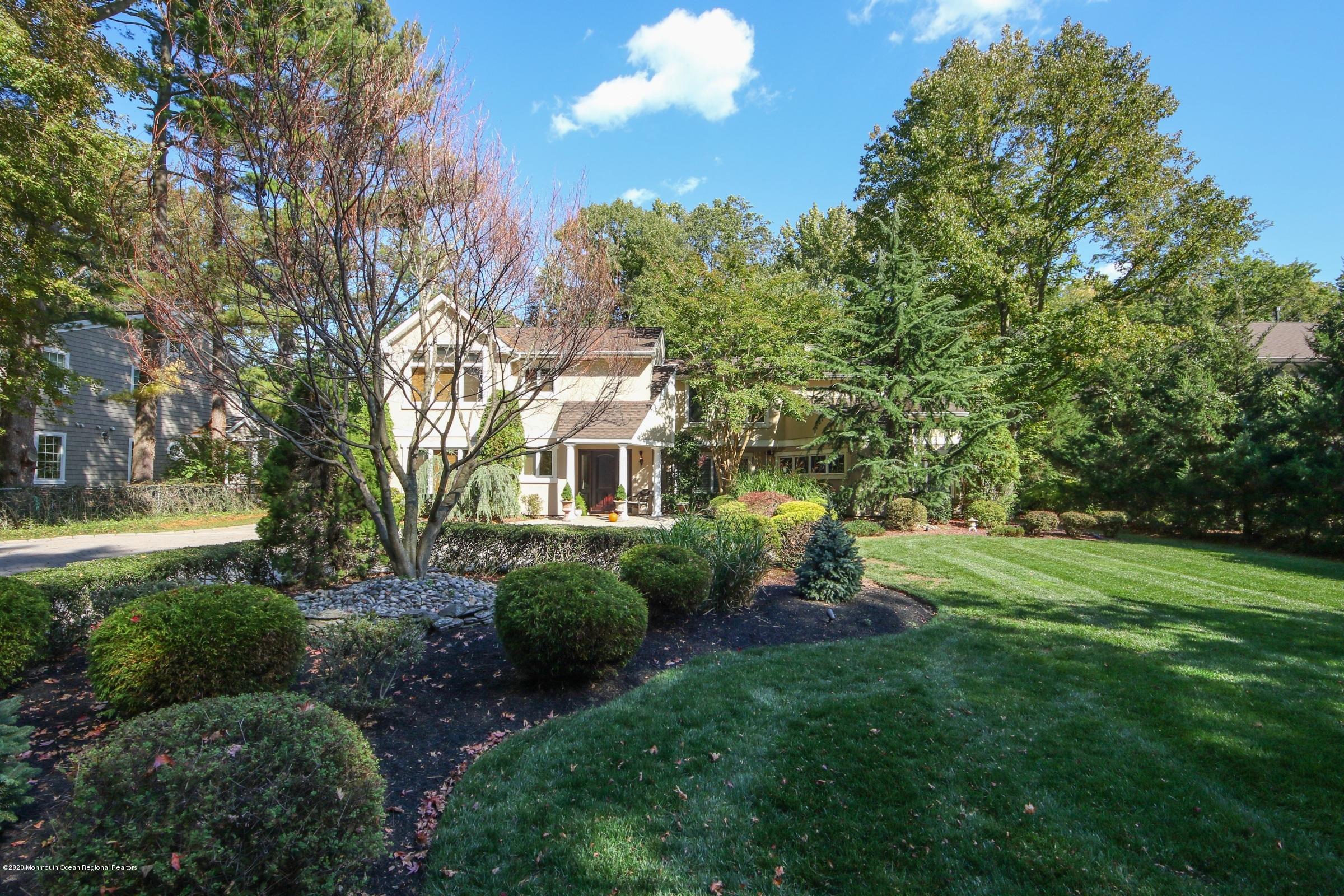 18 Daniel Drive Little Silver, NJ 07739 - Photo 54 of 55 a view of a garden with a fountain