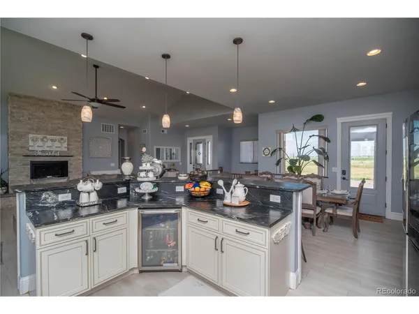 a kitchen with a counter space cabinets and appliances