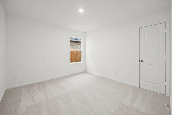 a kitchen with stainless steel appliances kitchen island granite countertop a stove a sink and a microwave