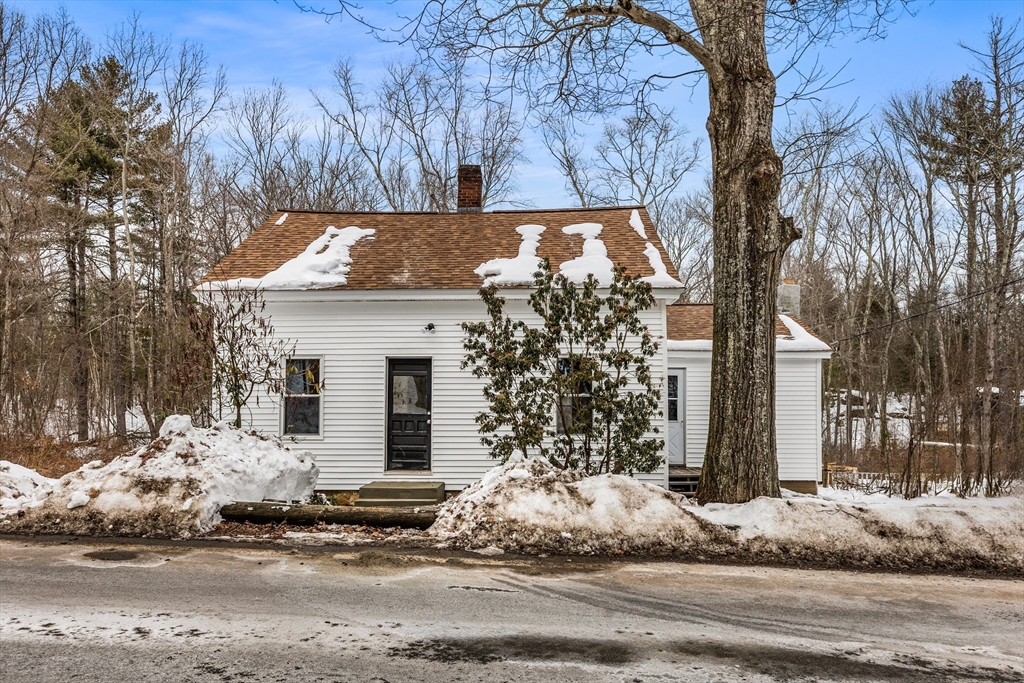 597 Mendon Road Northbridge, MA 01534 - Photo 1 of 13 a view of a house with snow on the tree