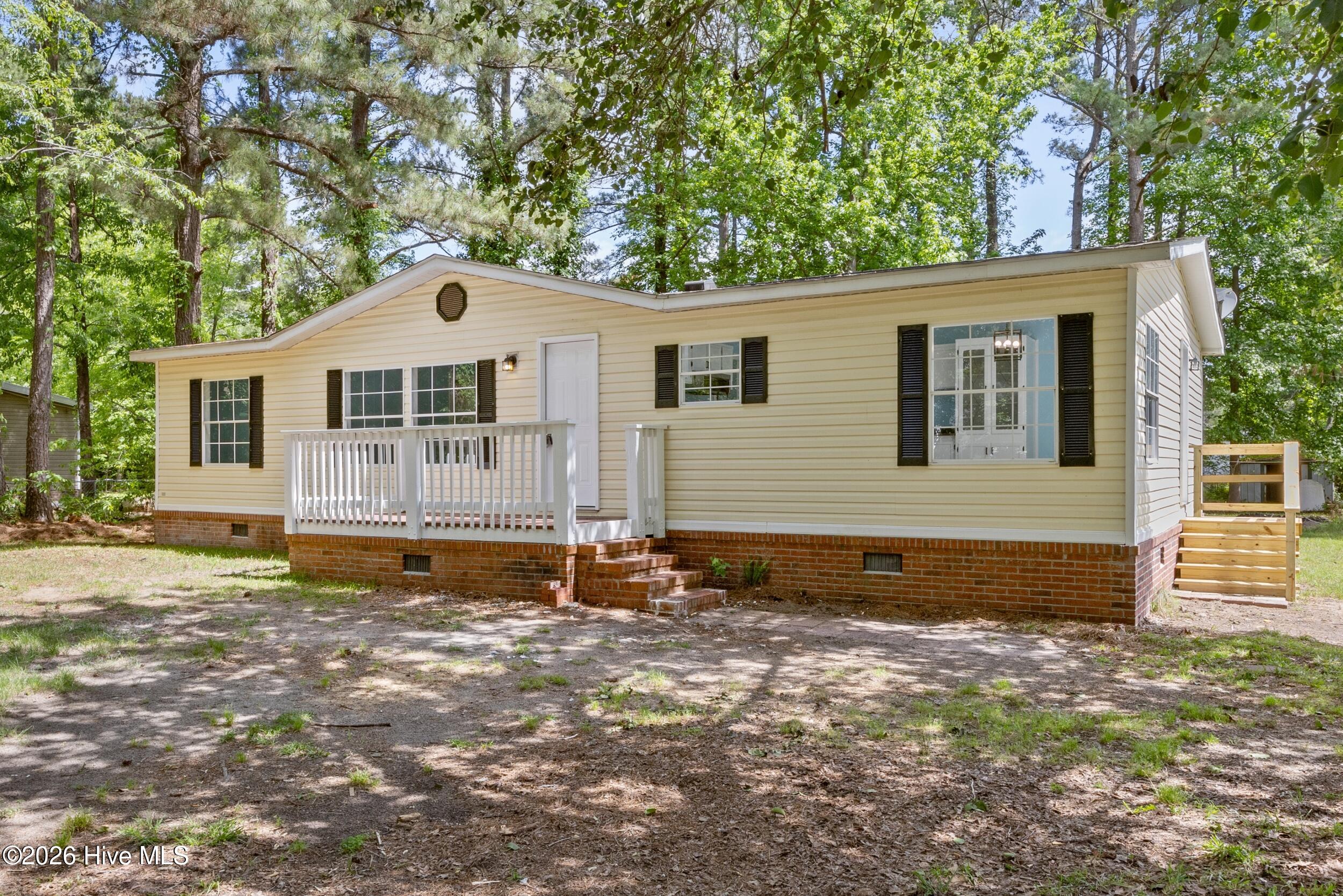 211 Pond Road Rocky Point, NC 28457 - Photo 2 of 38 2_front exterior