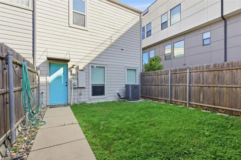 a view of a back yard of the house