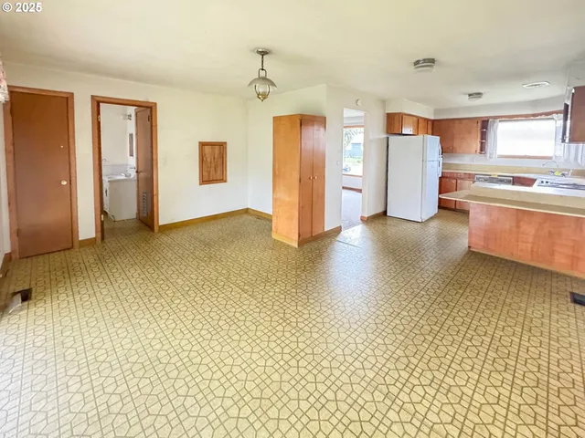 a view of a kitchen with a sink