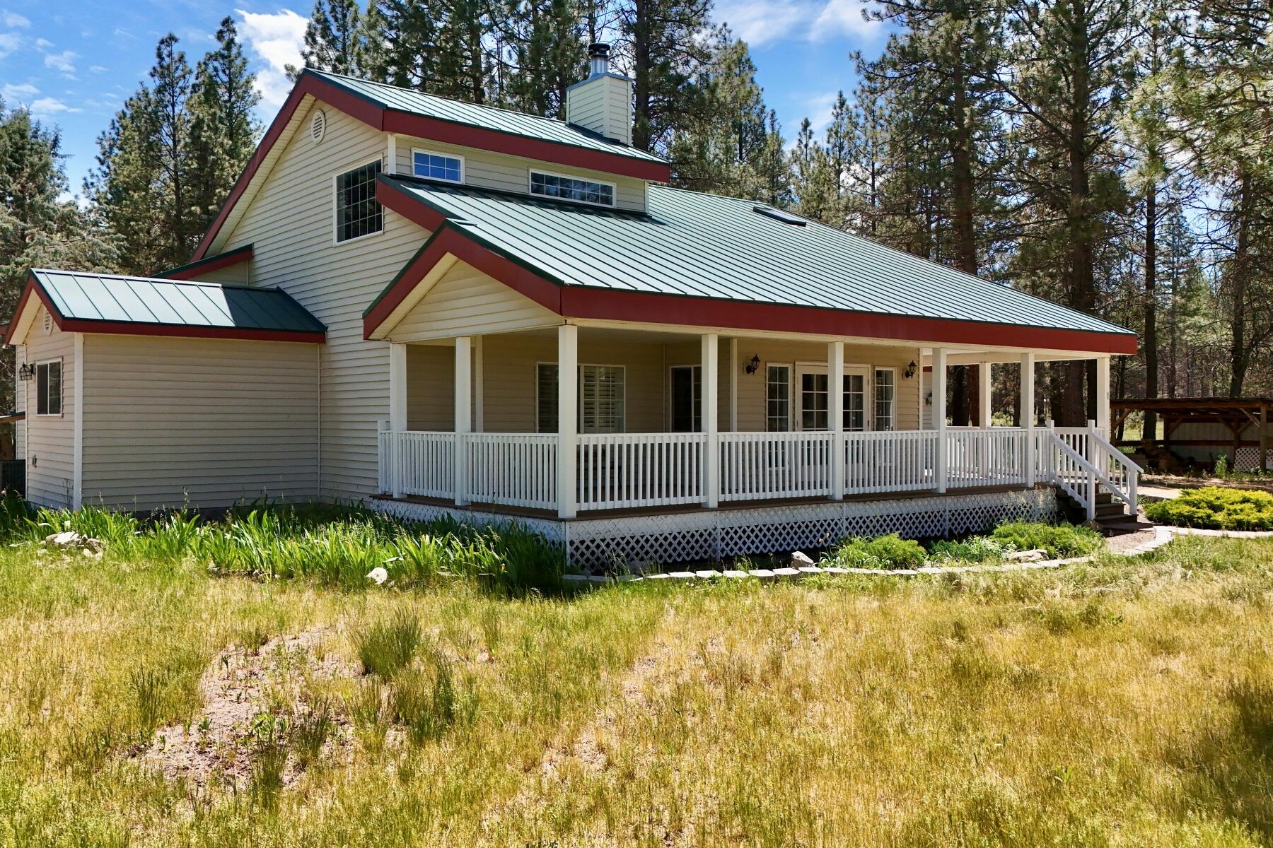 25210 Sprague River Road Sprague River, OR 97639 - Photo 5 of 79 a house with trees in the background