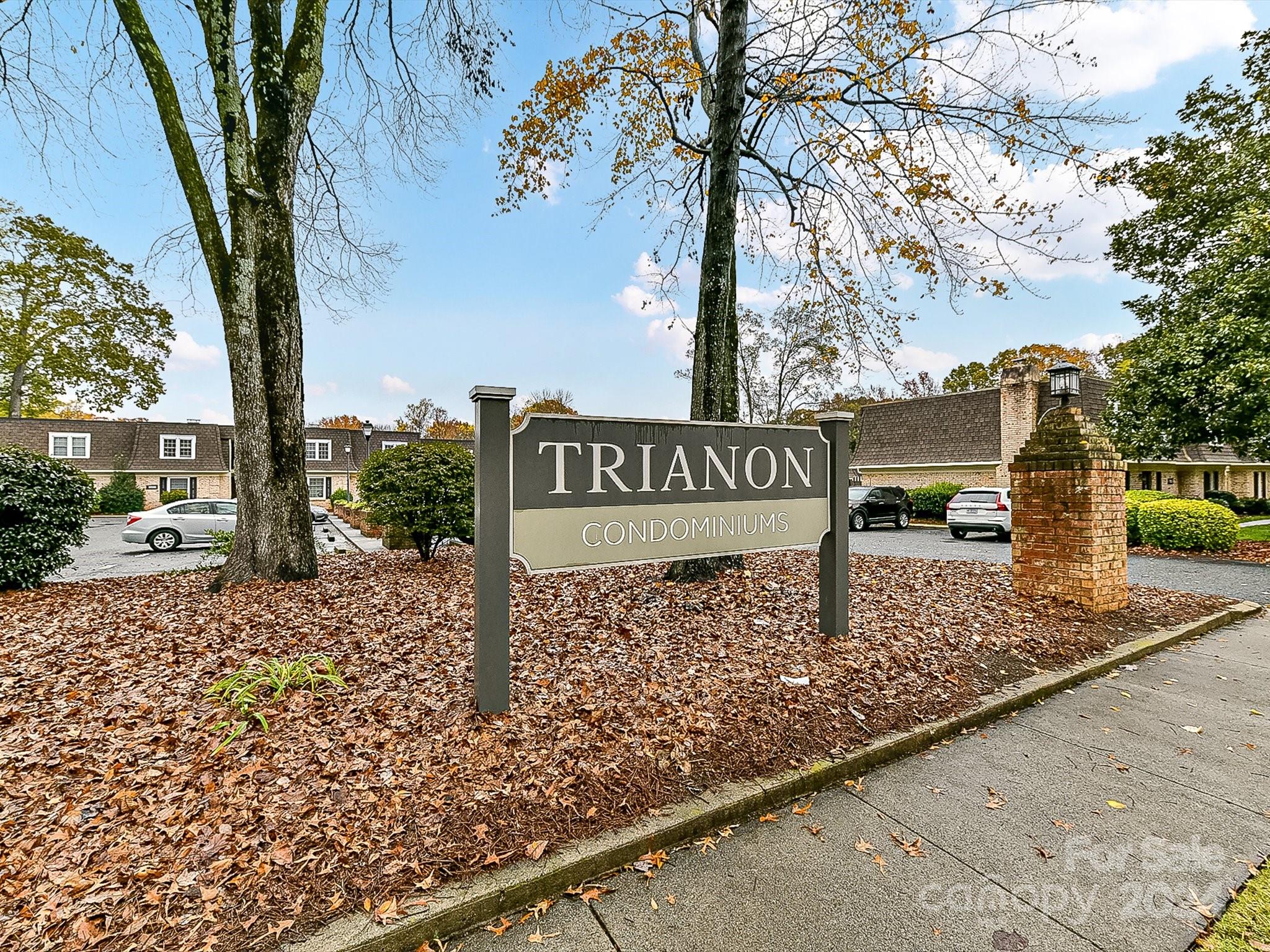 1708 Roxborough Road, Unit E Charlotte, NC 28211 - Photo 20 of 20 a view of a street with sign board