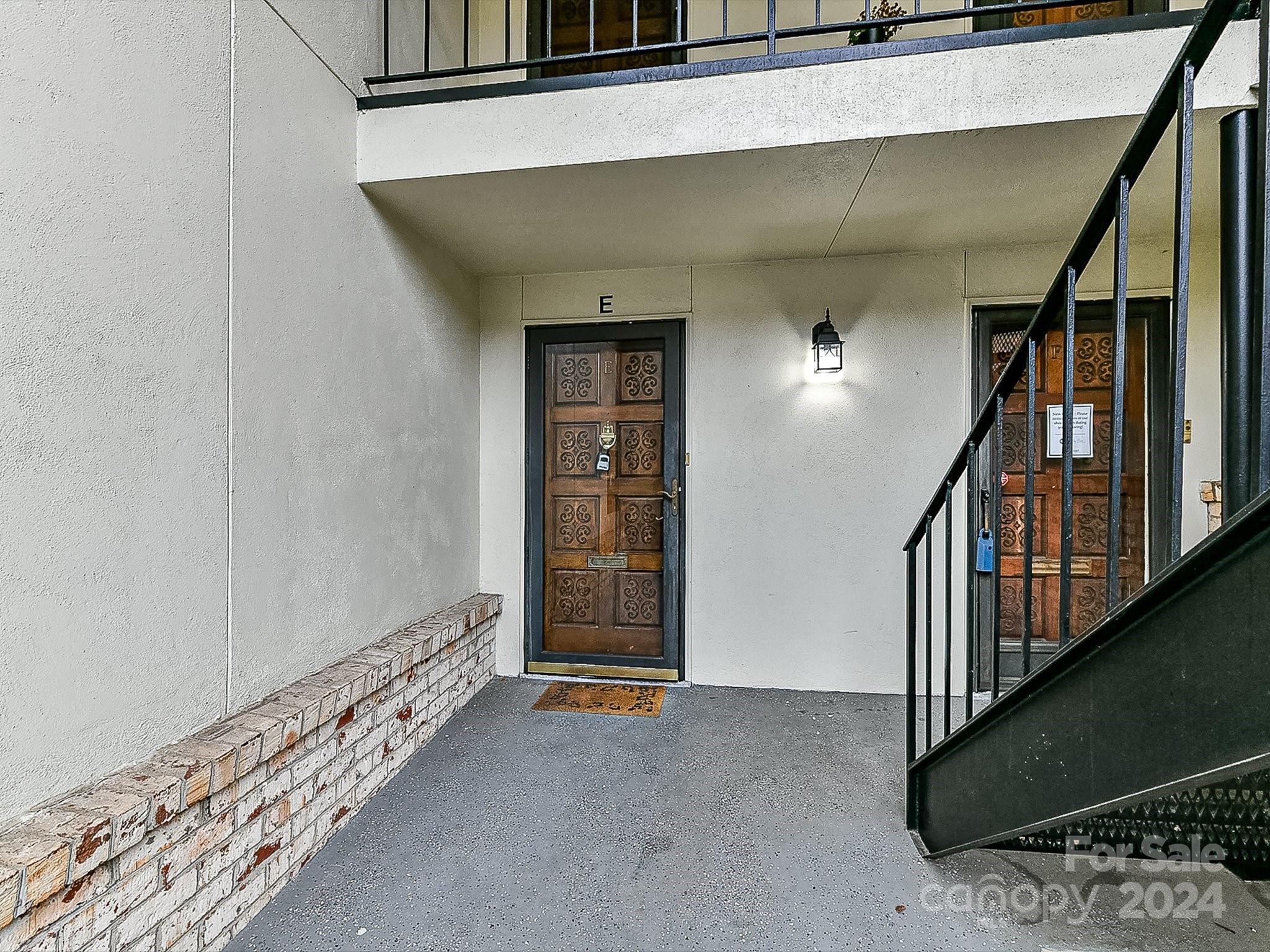 1708 Roxborough Road, Unit E Charlotte, NC 28211 - Photo 4 of 20 a view of an entryway with staircase