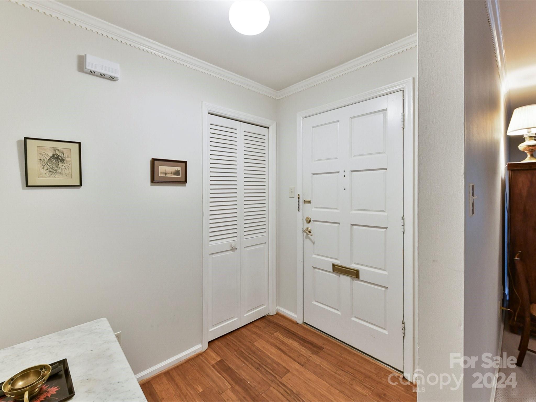 1708 Roxborough Road, Unit E Charlotte, NC 28211 - Photo 5 of 20 a view of empty room with wooden floor