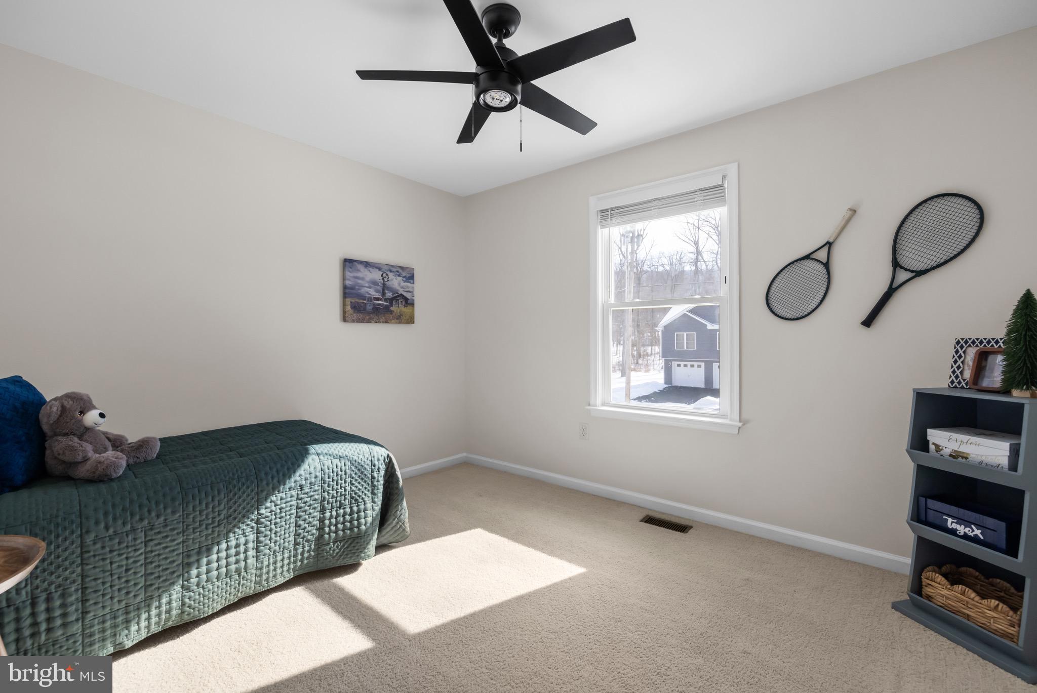 733 Red Bird Lane Harpers Ferry, WV 25425 - Photo 13 of 29 a bedroom with a bed and window