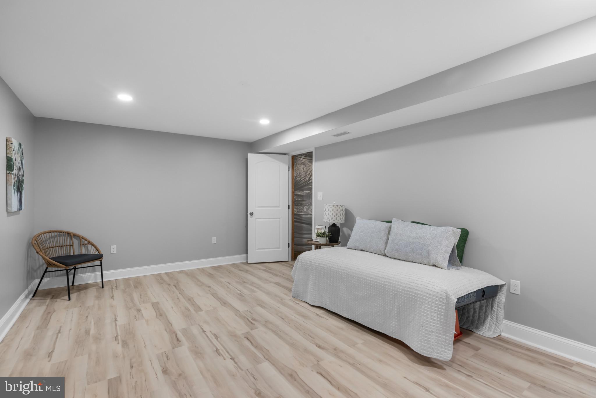 733 Red Bird Lane Harpers Ferry, WV 25425 - Photo 19 of 29 a room with a bed and a chair