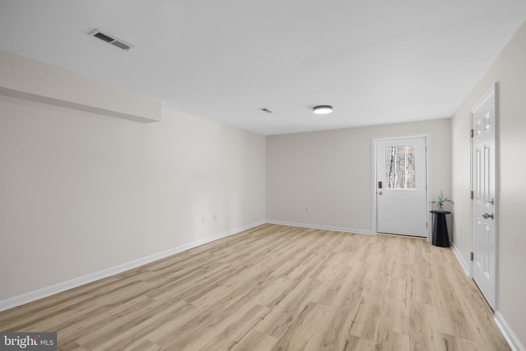 733 Red Bird Lane Harpers Ferry, WV 25425 - Photo 21 of 29 a view of an empty room with closet and a window