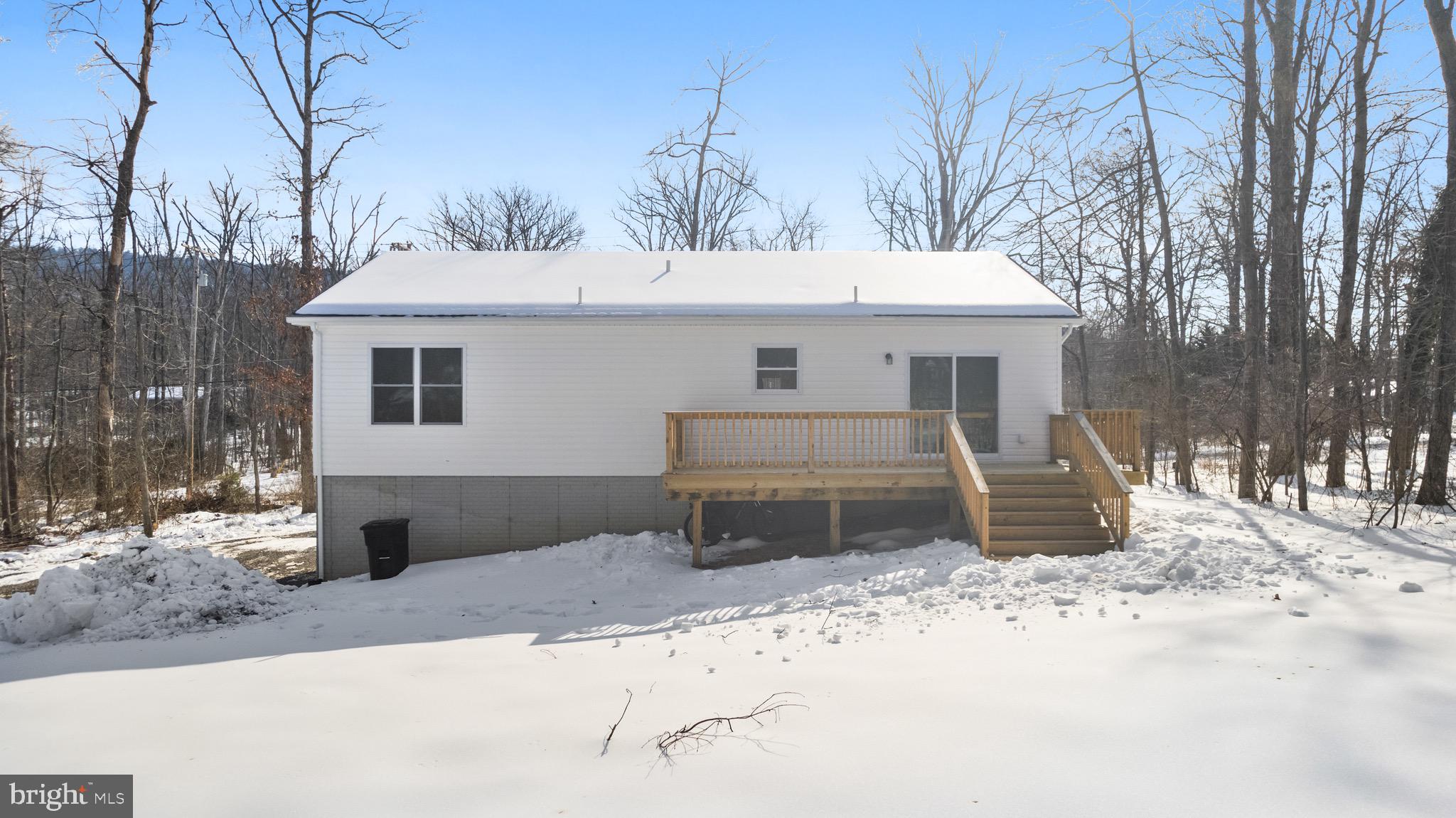 733 Red Bird Lane Harpers Ferry, WV 25425 - Photo 24 of 29 a view of a house with a yard covered in snow