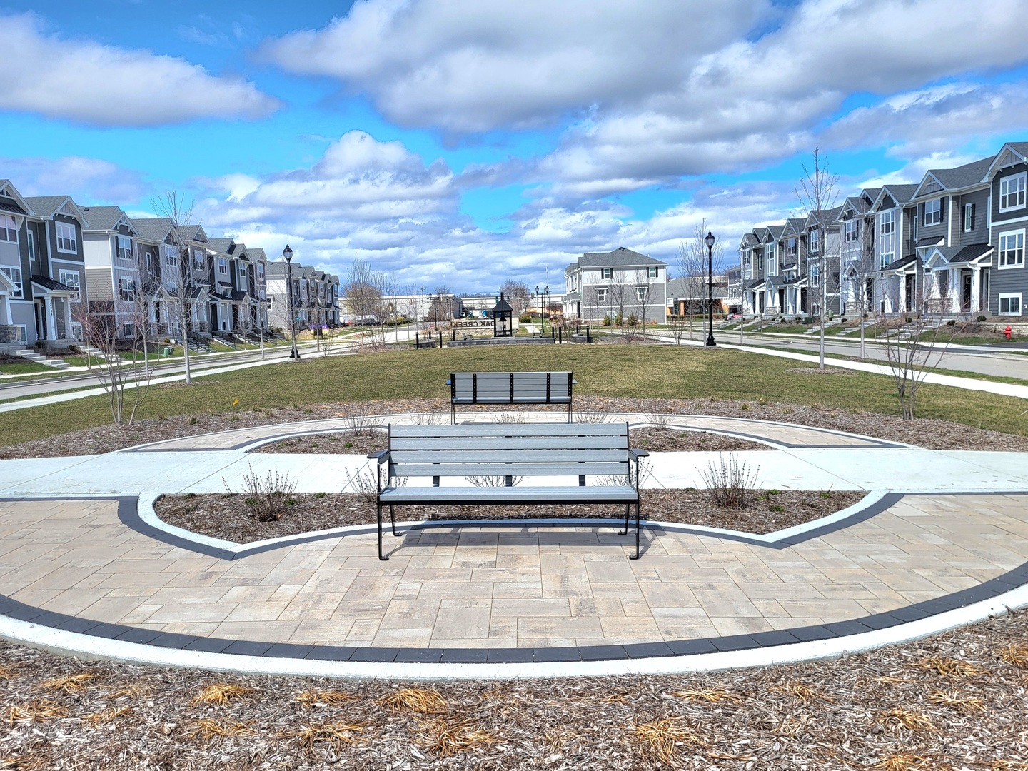 563 Yosemite Way Mundelein, IL 60060 - Photo 13 of 34 a view of a swimming pool with a lake