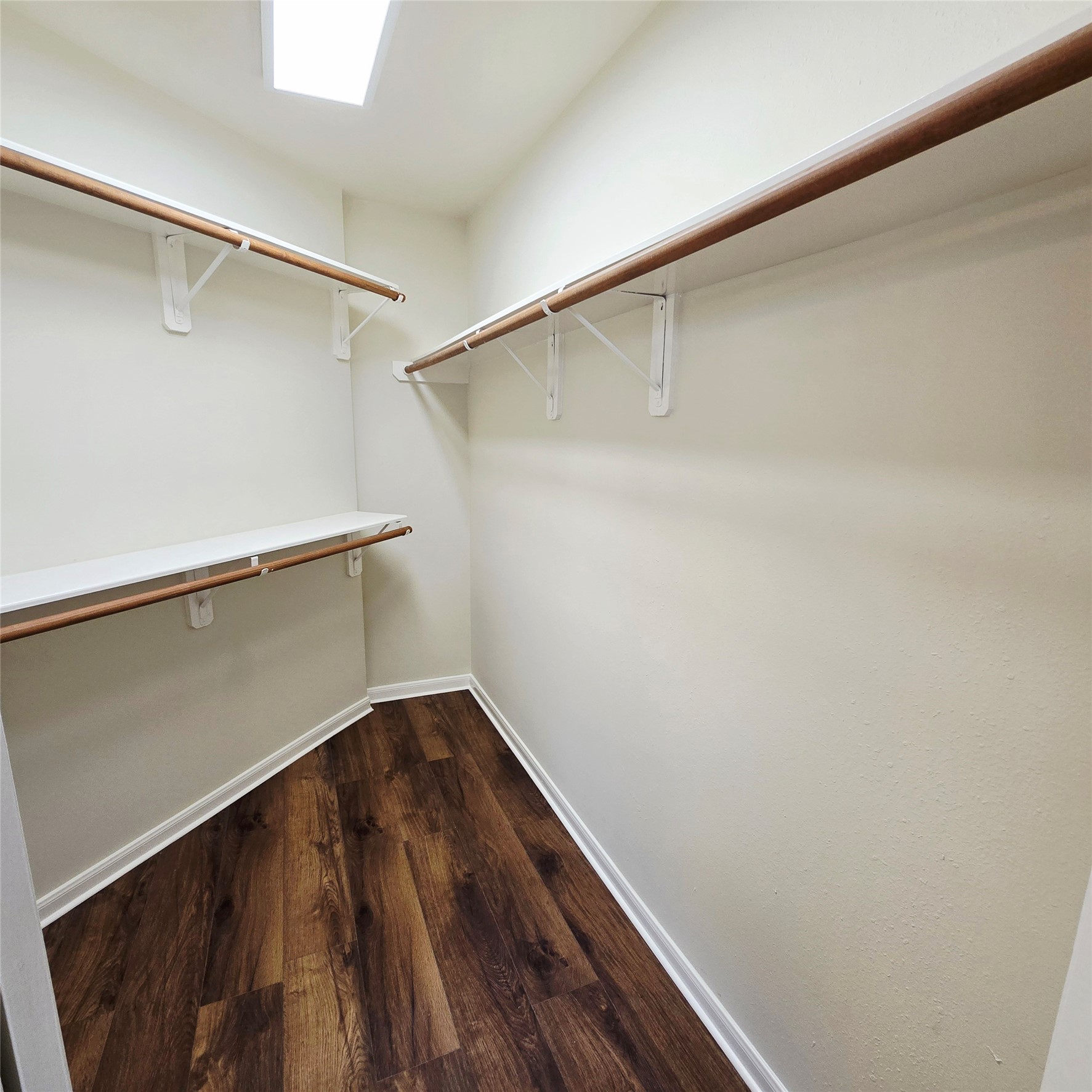 6411 Slate Stone Street Houston, TX 77084 - Photo 10 of 38 Discover the convenience of two spacious closets in the primary bathroom, perfect for all your storage needs.