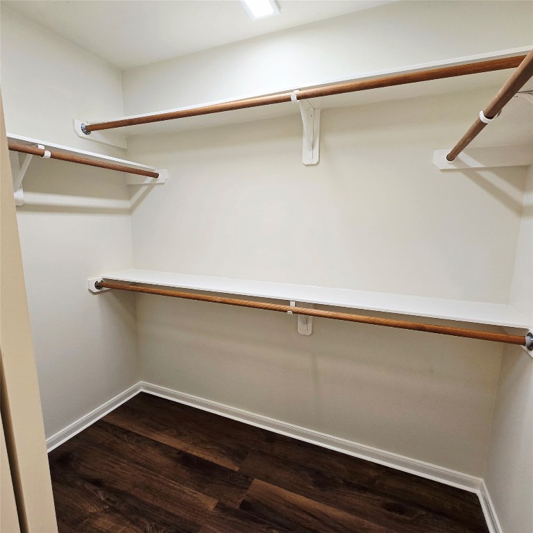 6411 Slate Stone Street Houston, TX 77084 - Photo 11 of 38 Second closet in the primary bathroom, featuring convenient shelves and rods for optimal storage.