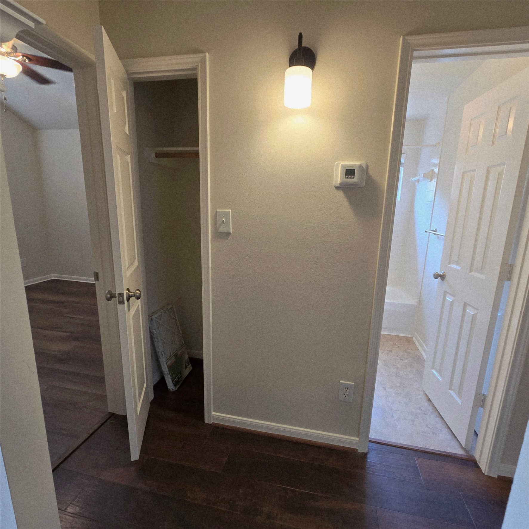6411 Slate Stone Street Houston, TX 77084 - Photo 17 of 38 A convenient coat closet is located in the hallway between the two bedrooms.