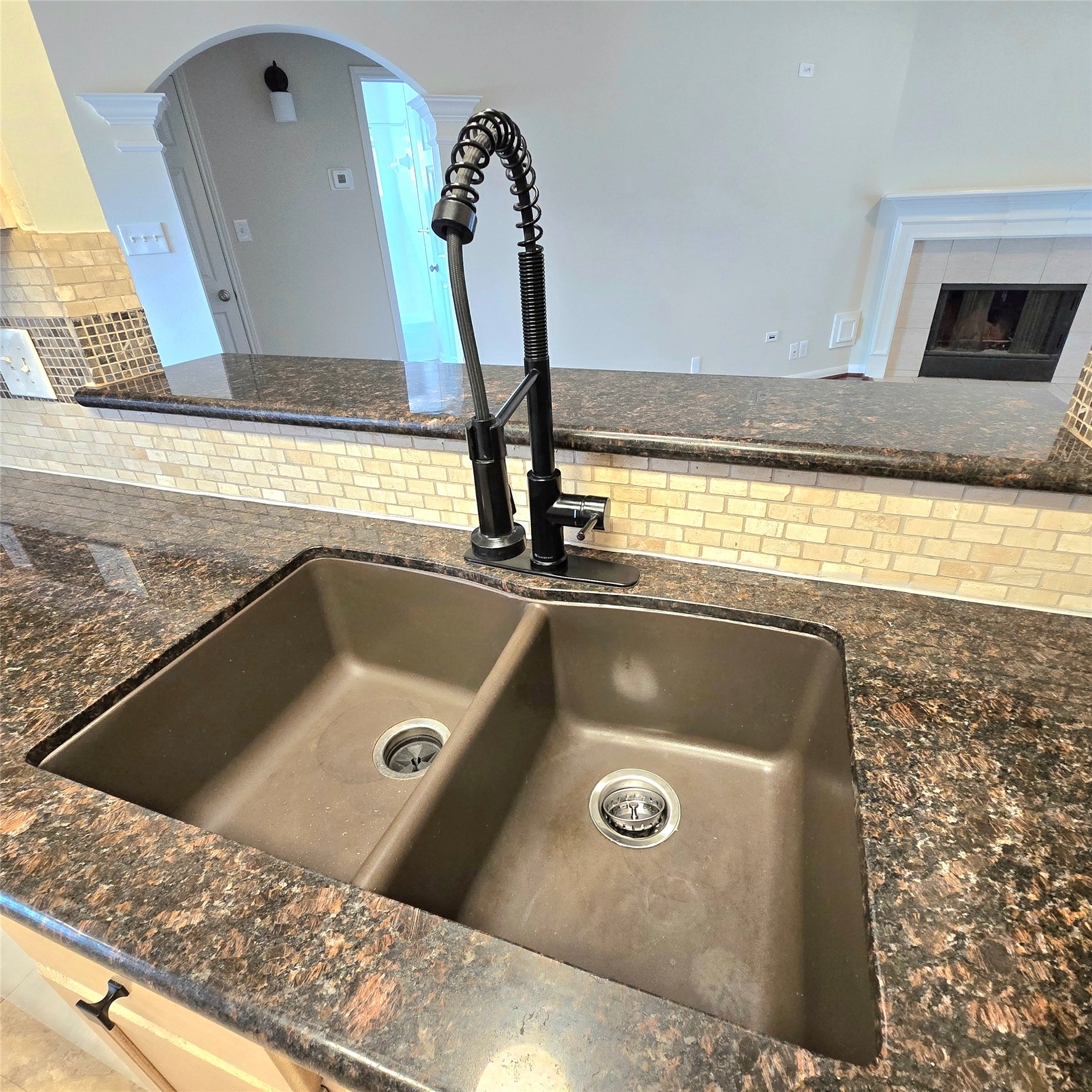 6411 Slate Stone Street Houston, TX 77084 - Photo 23 of 38 Double sink with modern faucet on elegant granite countertop.