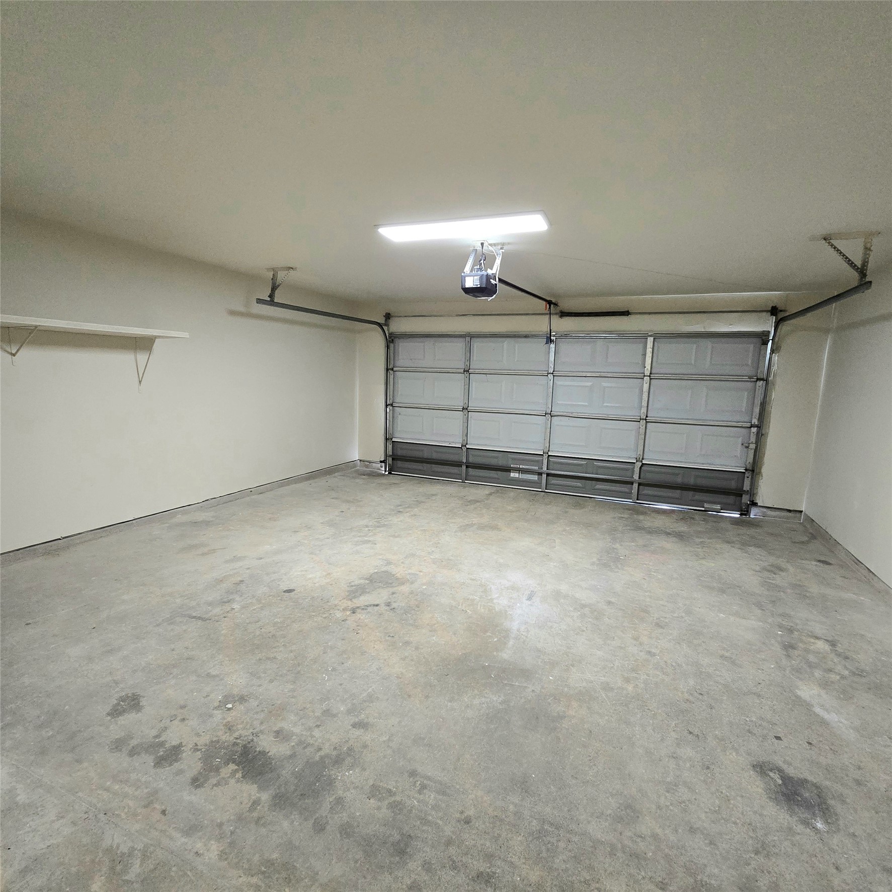 6411 Slate Stone Street Houston, TX 77084 - Photo 30 of 38 Spacious 2-car garage with automatic opener.