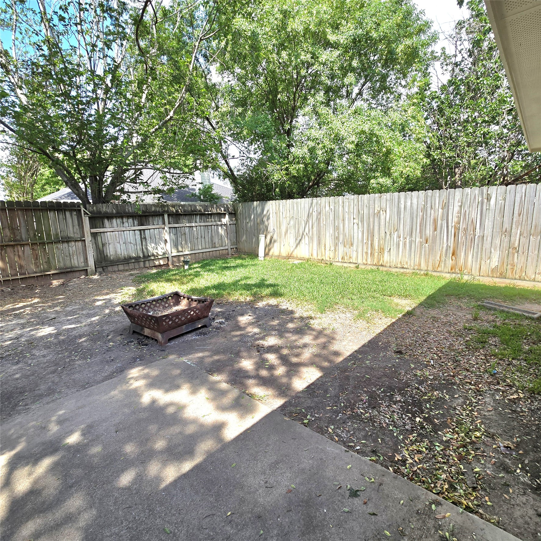 6411 Slate Stone Street Houston, TX 77084 - Photo 31 of 38 Backyard with concrete patio, perfect for a relaxing morning or afternoon.