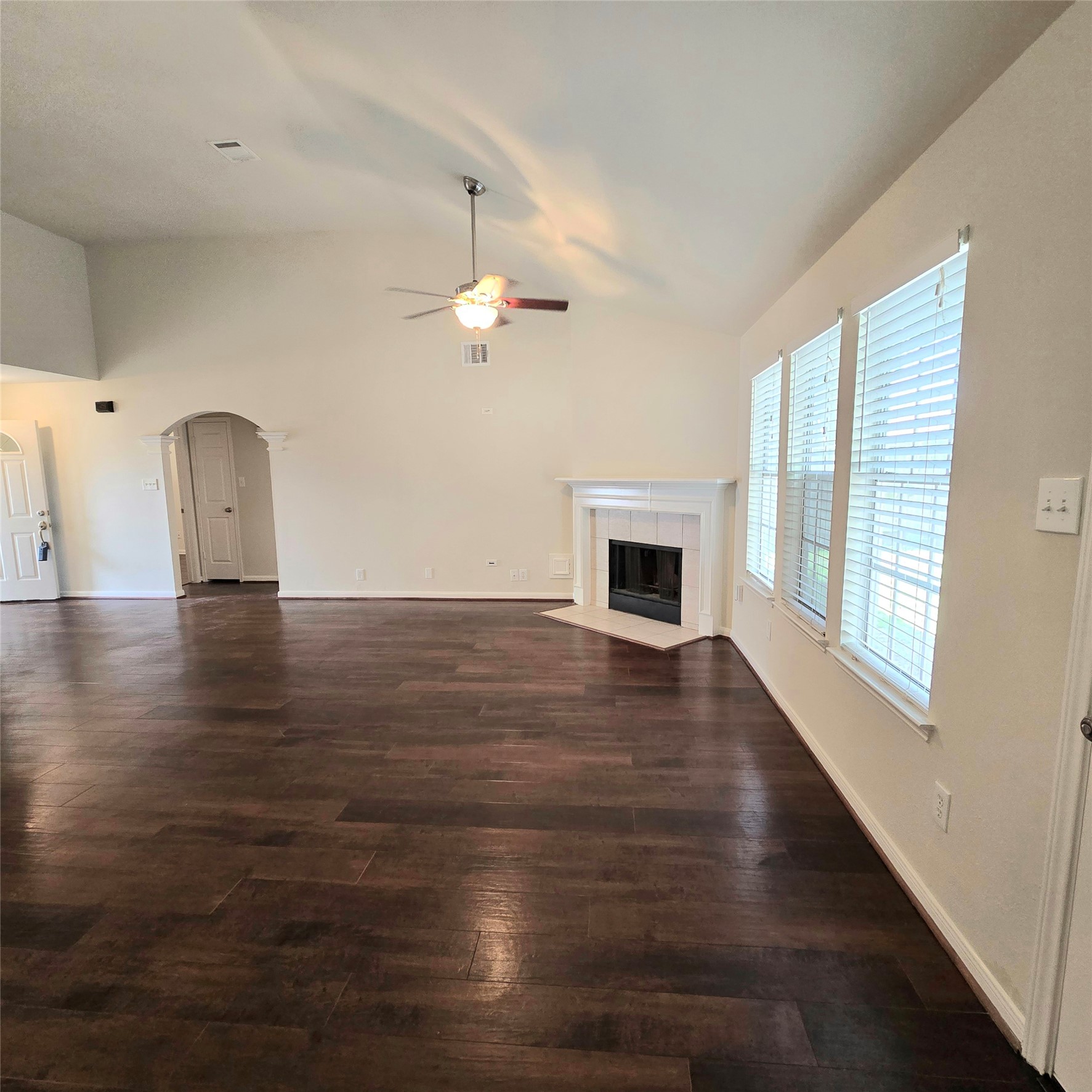 6411 Slate Stone Street Houston, TX 77084 - Photo 5 of 38 Spacious family room with backyard views and a convenient pass-through to the kitchen.