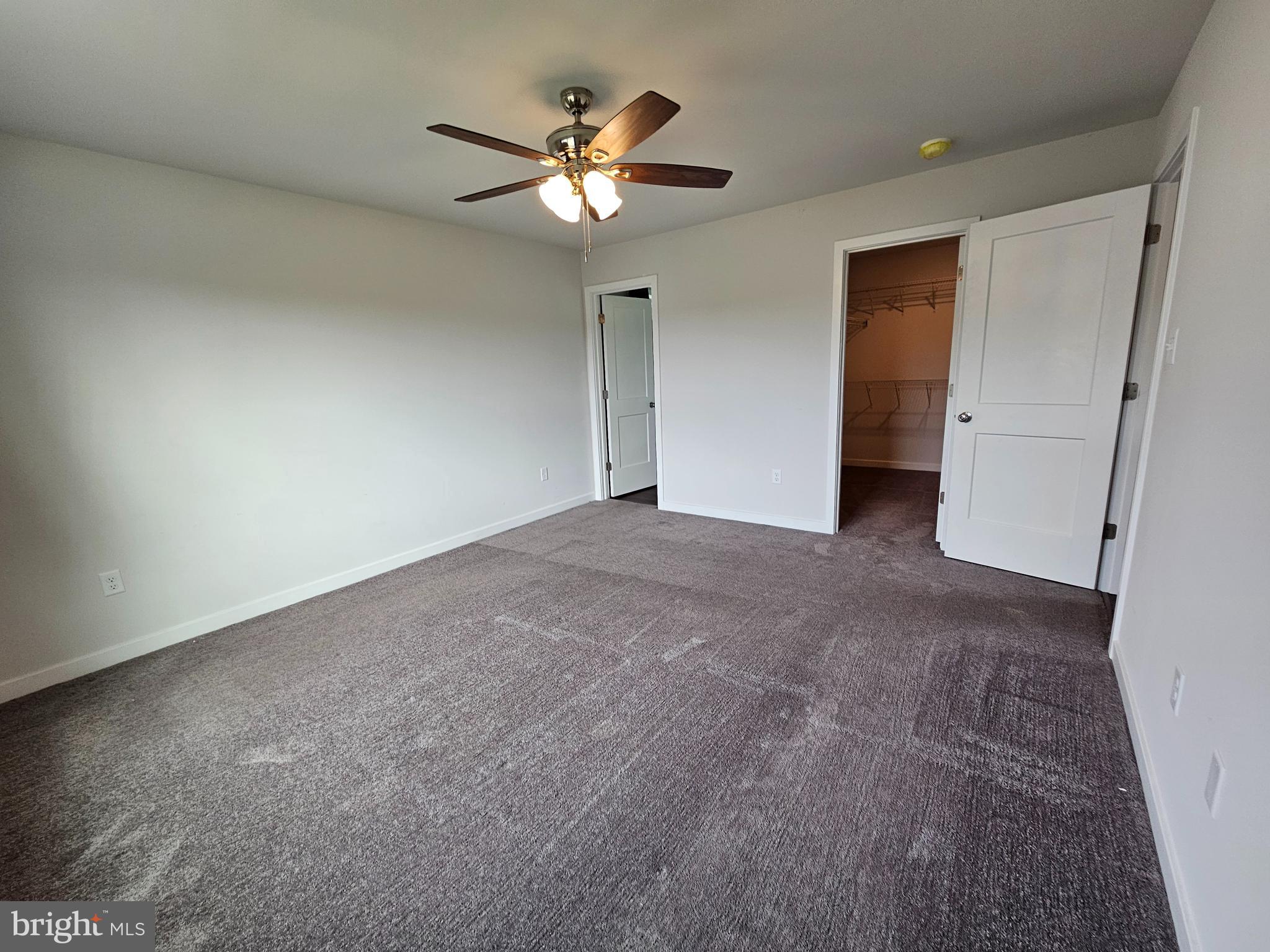 47 Bobbi Court Berkeley Springs, WV 25411 - Photo 11 of 22 a view of an empty room with a chandelier fan