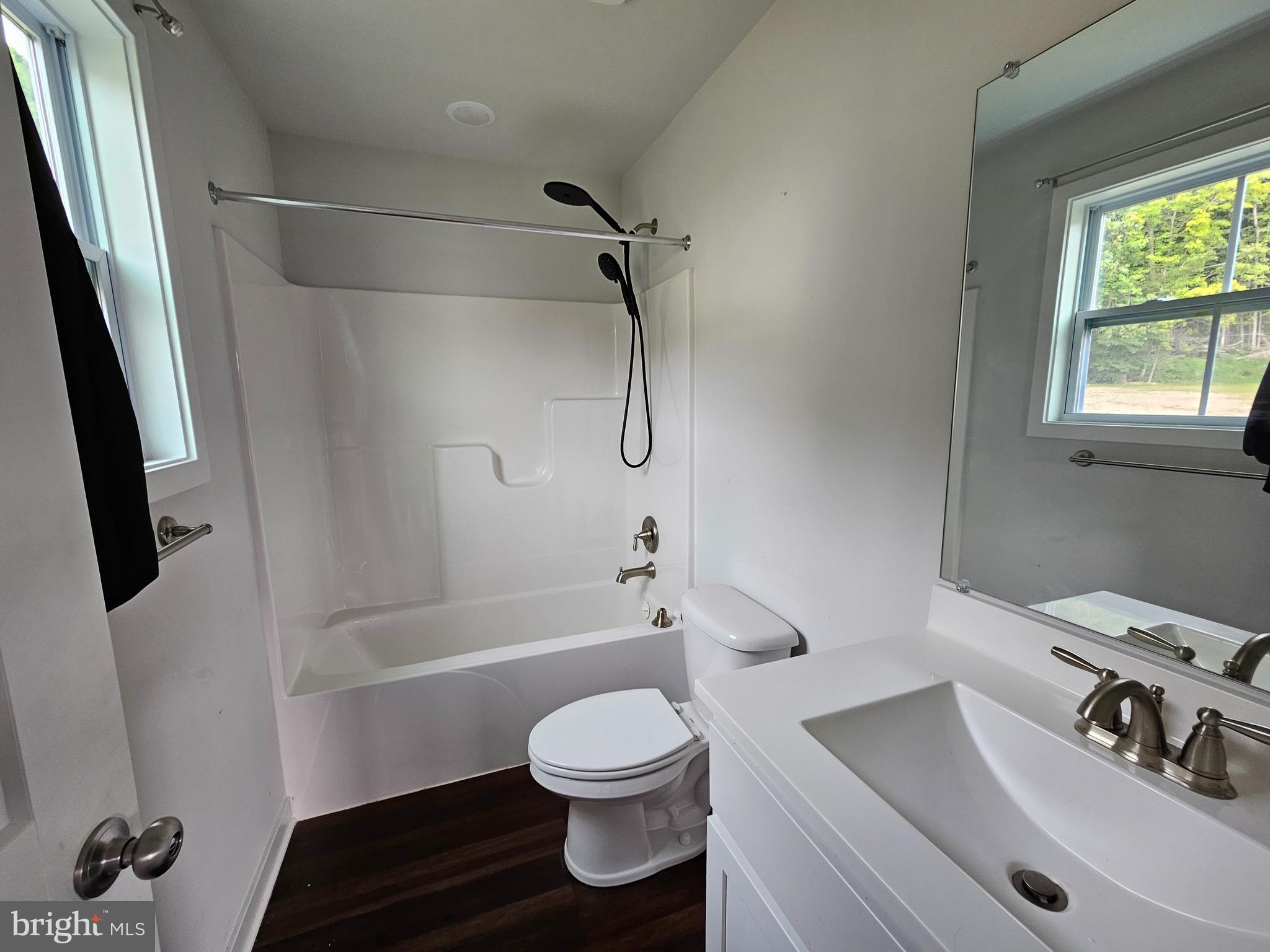 47 Bobbi Court Berkeley Springs, WV 25411 - Photo 13 of 22 a bathroom with a sink toilet and shower